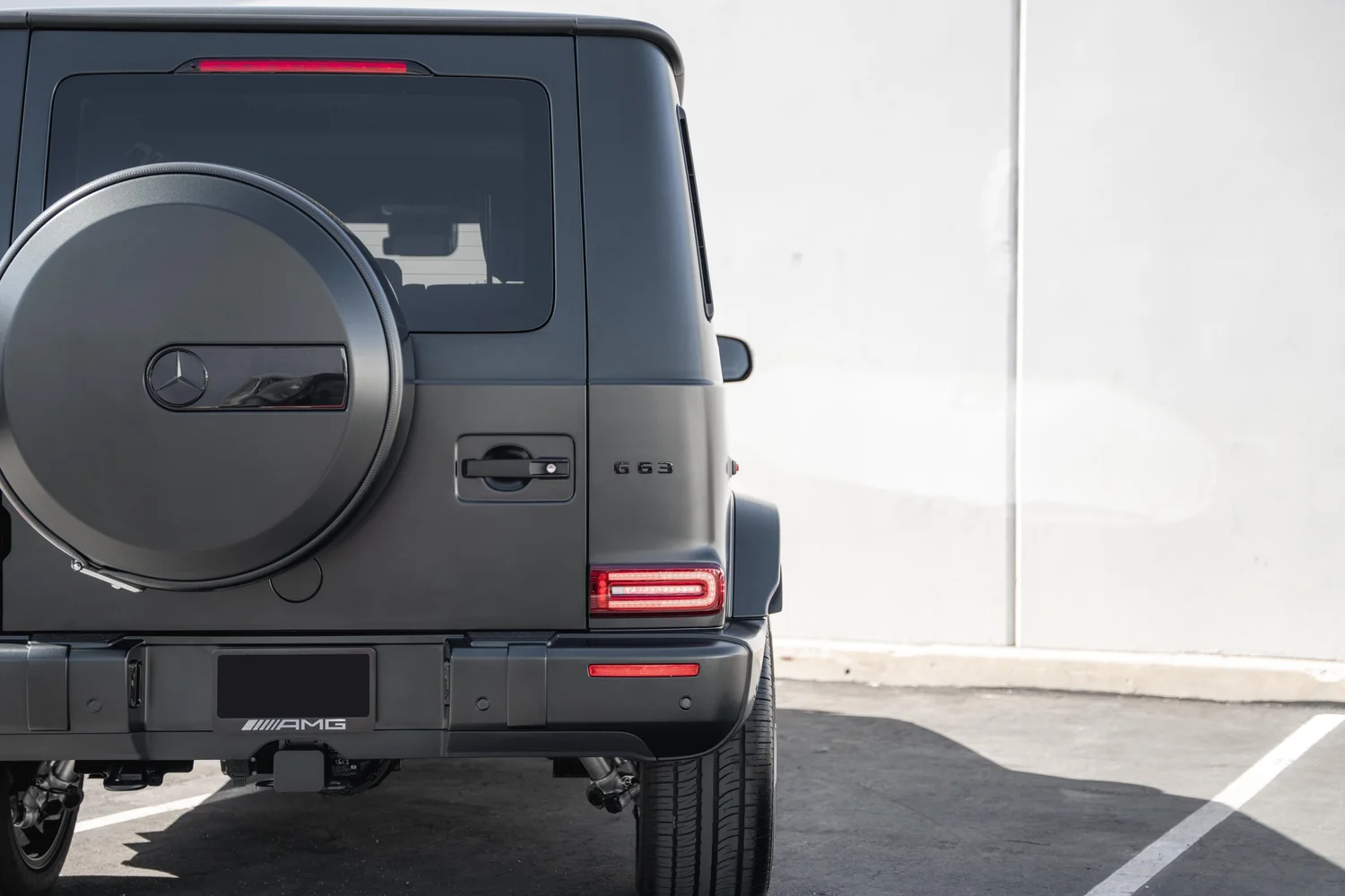 Charcoal Grey Mercedes-AMG G 63 after Matte PPF, Window Tint and Ceramic Coating, rear body and taillight view
