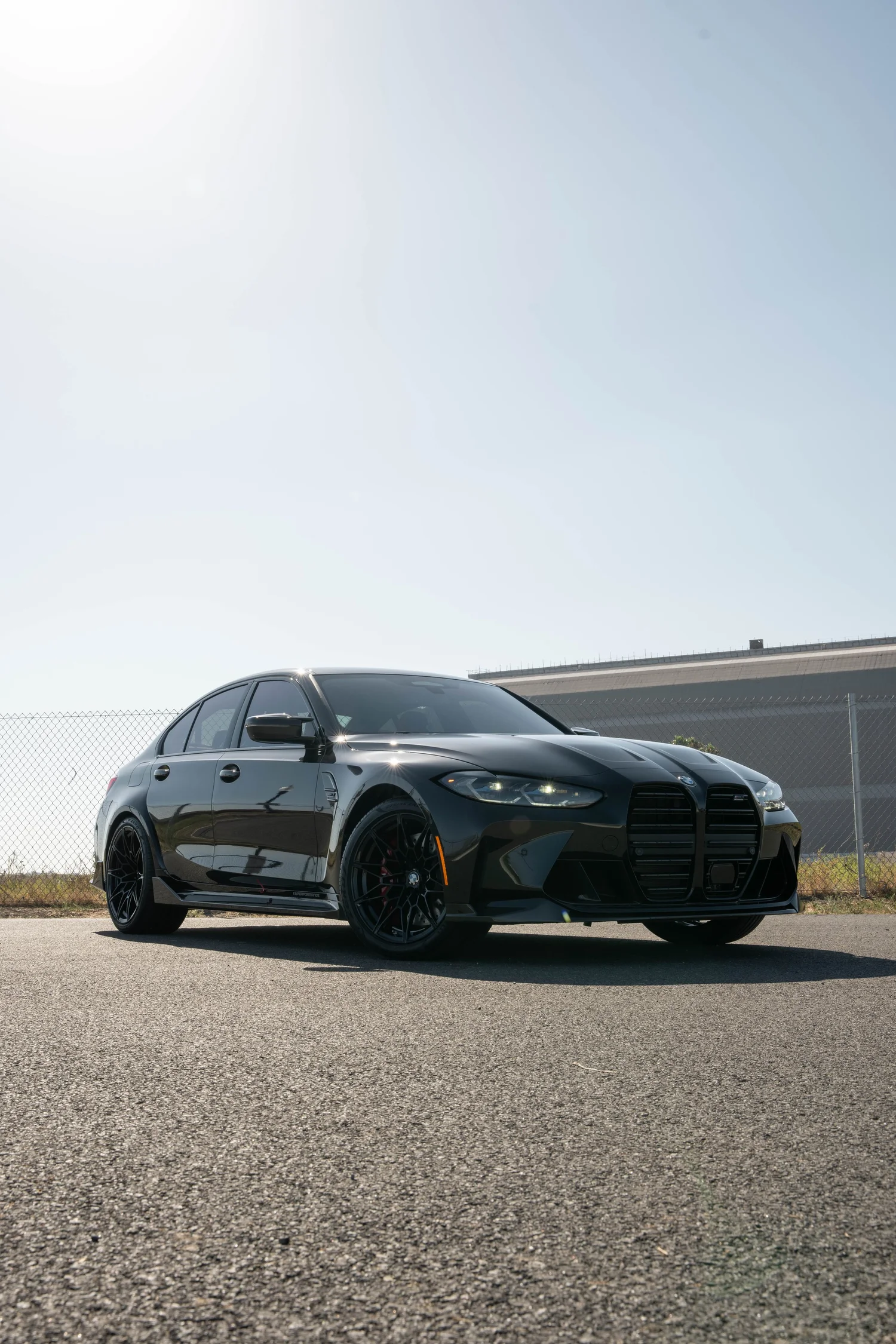 Black BMW M3 after Paint Protection Film (PPF), Window Tint and Ceramic Coating, front-left three-quarter view