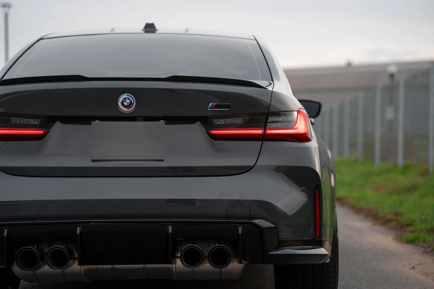 Dravit Grey BMW M3 after Paint Protection Film (PPF), Window Tint and Ceramic Coating, rear body and taillight view