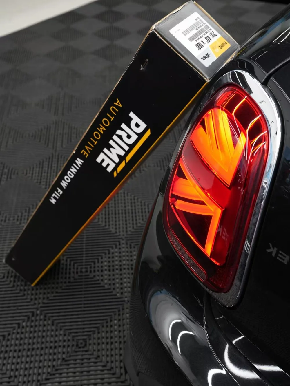 XPEL PRIME automotive window film beside a vehicle at Toyz Detail Studio.