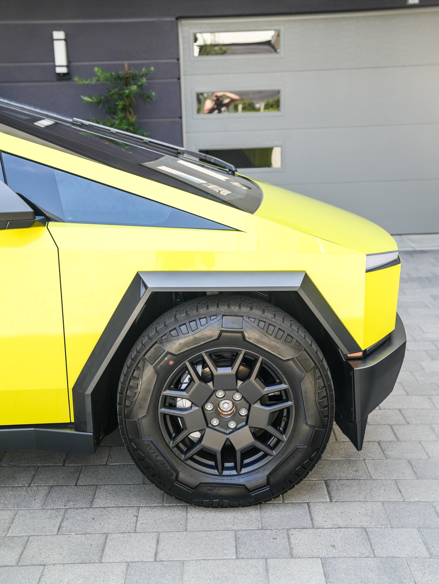 Tesla Cybertruck Inozetek Racing Yellow after Window Tint and Vinyl Wrap, front wheel and body view