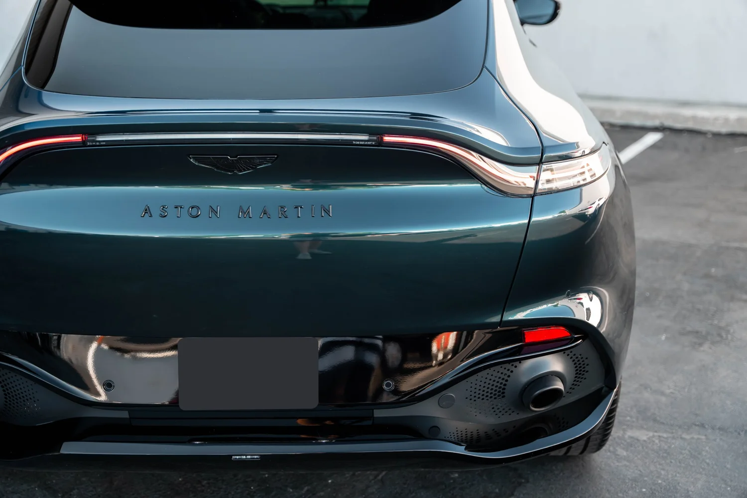 Aston Martin DBX after Paint Protection Film (PPF), Window Tint and Ceramic Coating, rear bumper and taillight detail