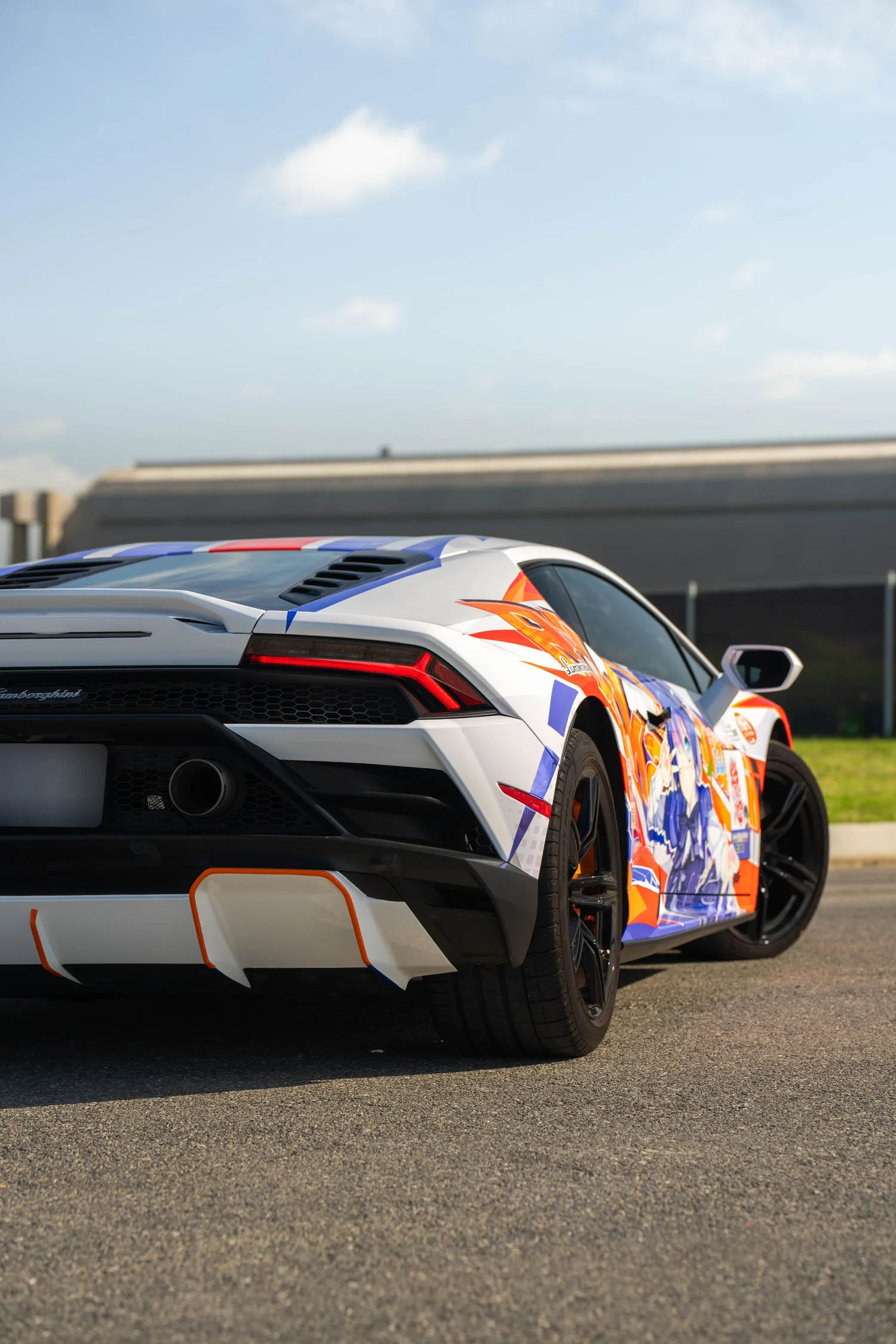 Lamborghini Huracán EVO Custom Wrap after Vinyl Wrap, low-angle rear view