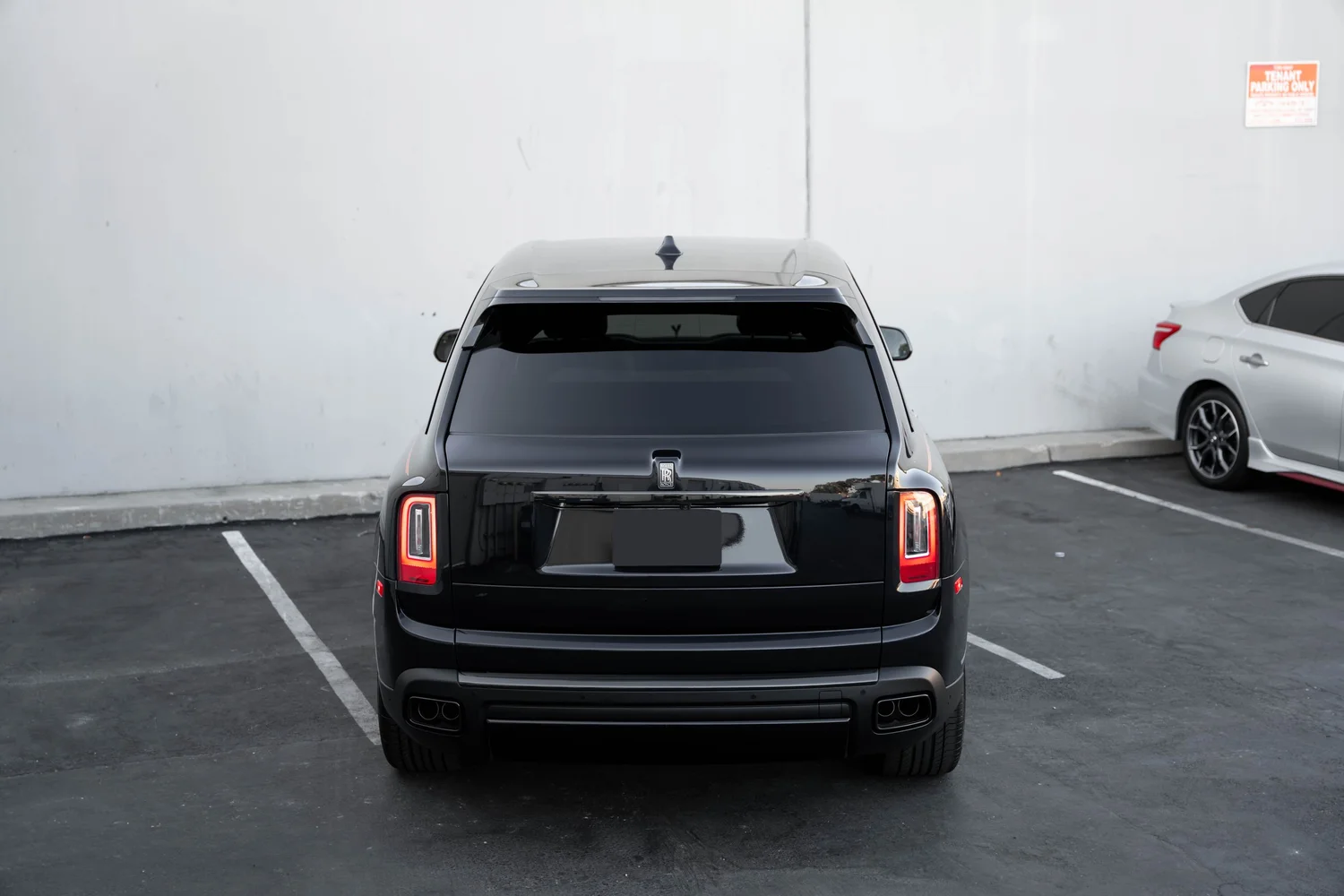 Black Rolls-Royce Cullinan Black Badge after Paint Protection Film (PPF), Window Tint and Ceramic Coating, direct rear view