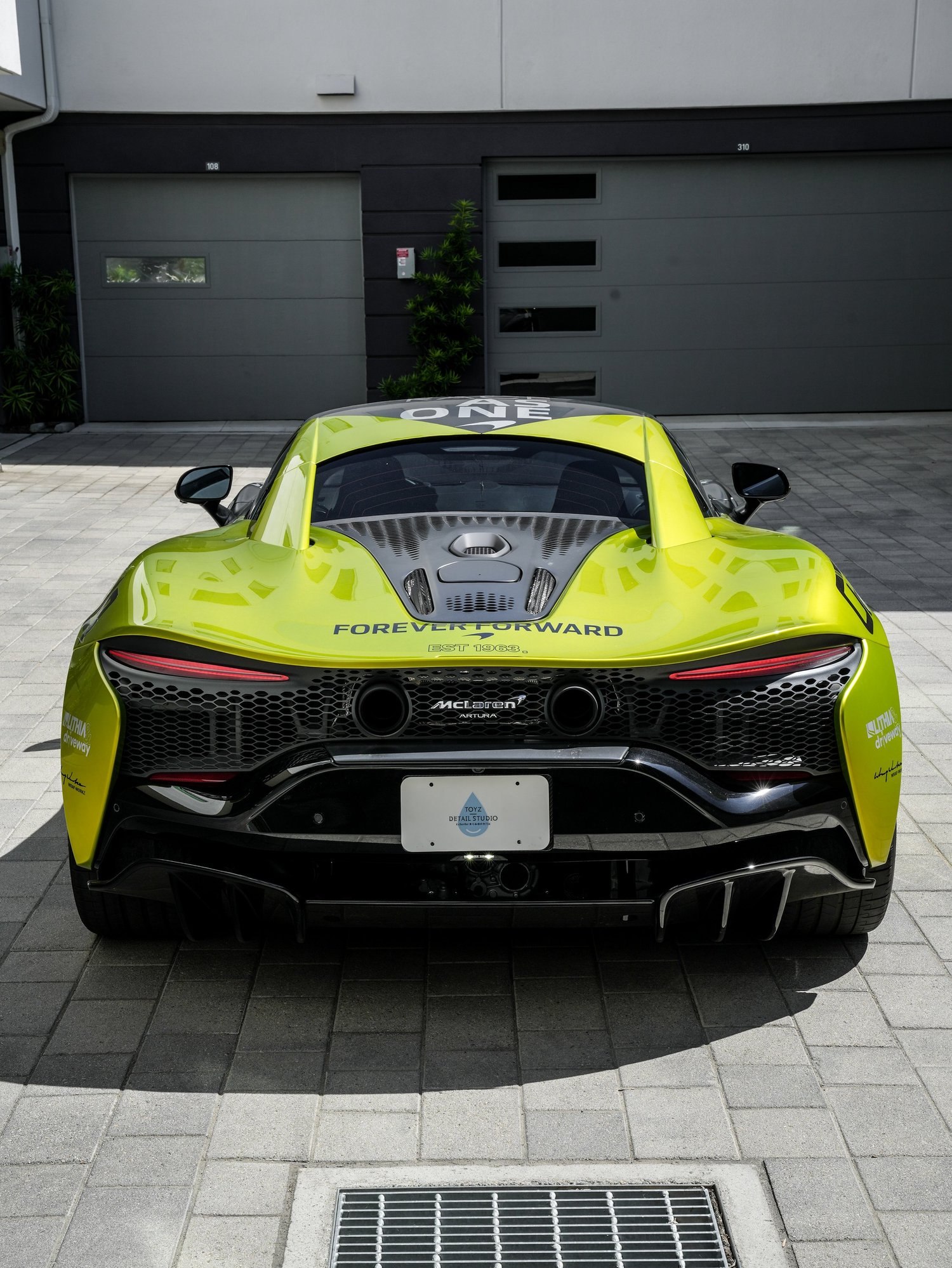 McLaren Artura MCL38 Tribute Custom Wrap after Window Tint, Vinyl Wrap and Custom Graphics, low-angle front view