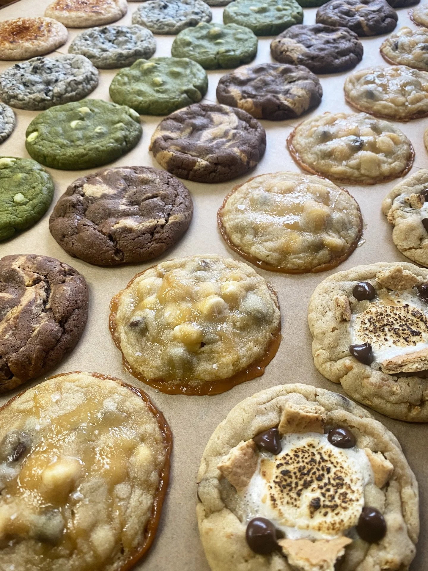 Assorted cookies ft. cr&egrave;me br&ucirc;l&eacute;e snickerdoodle, black sesame dark chocolate chip, matcha white chocolate macadamia, dark chocolate pb swirl, sea salt caramel chocolate chip, and s'more 🍪