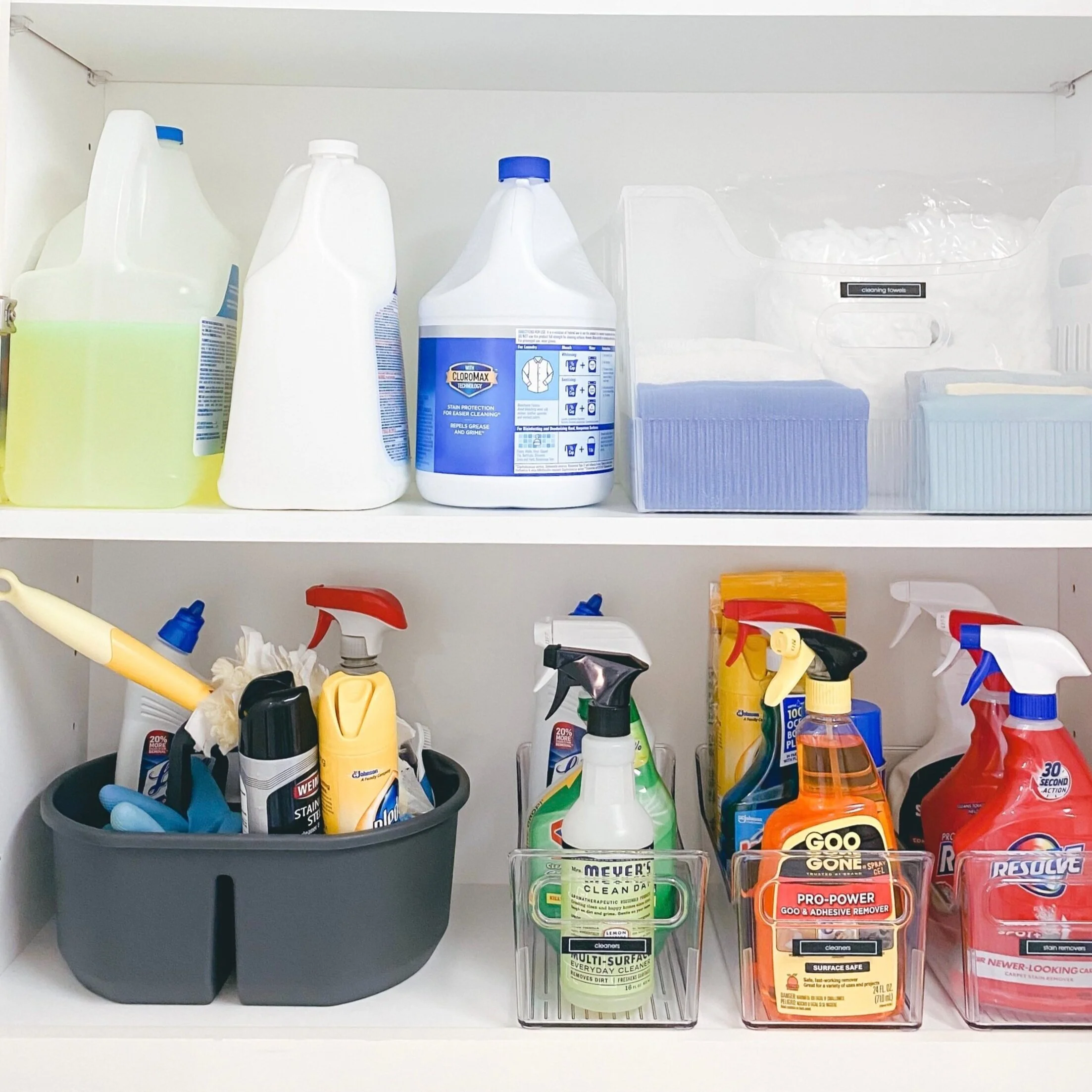 Cleaning products thoughtfully organized into labeled acrylic bins, multipurpose bin and caddy by Sorted Professional Organizing in New Orleans.