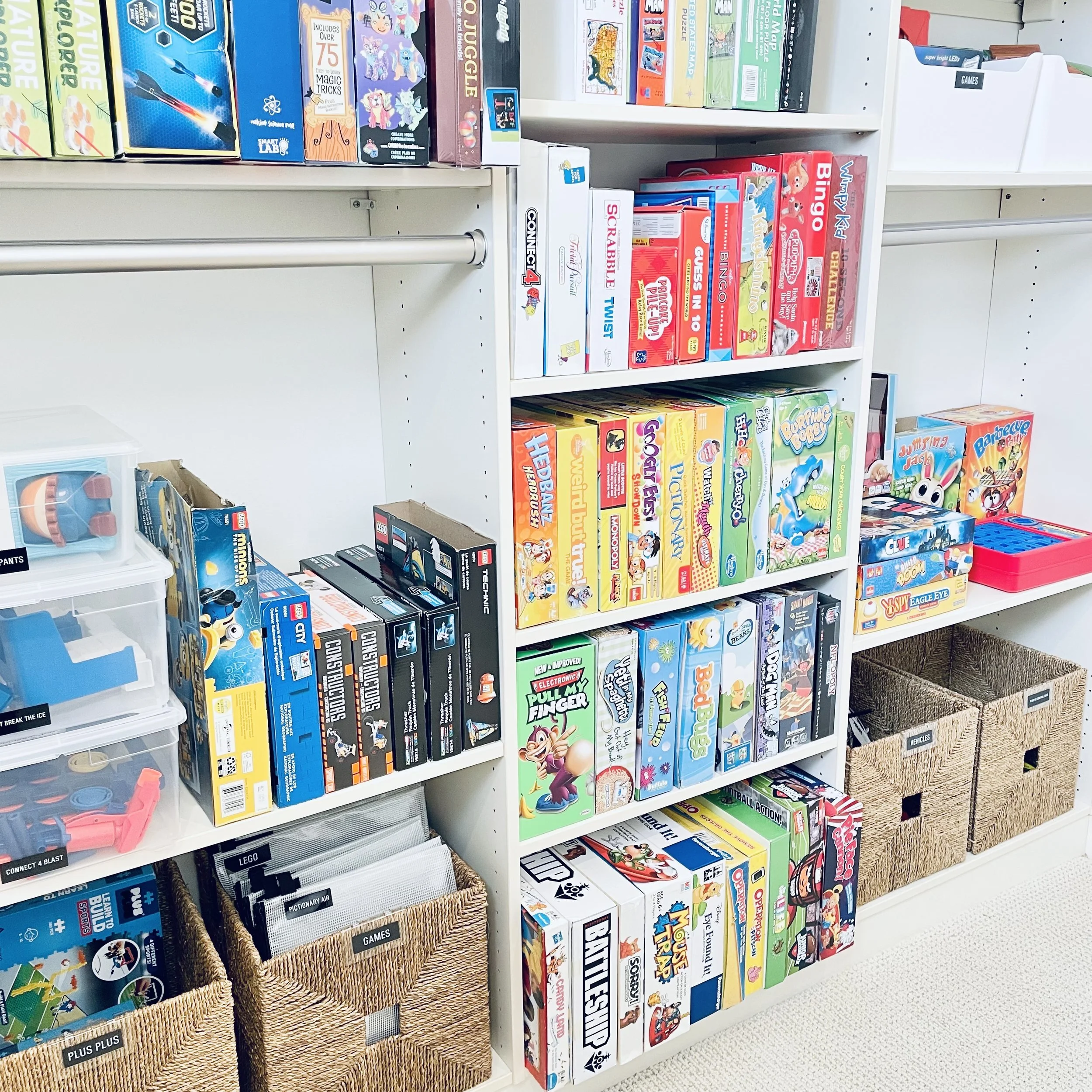 Closet storage for kids' games and puzzles decluttered by Sorted Professional Organizing in New Orleans.