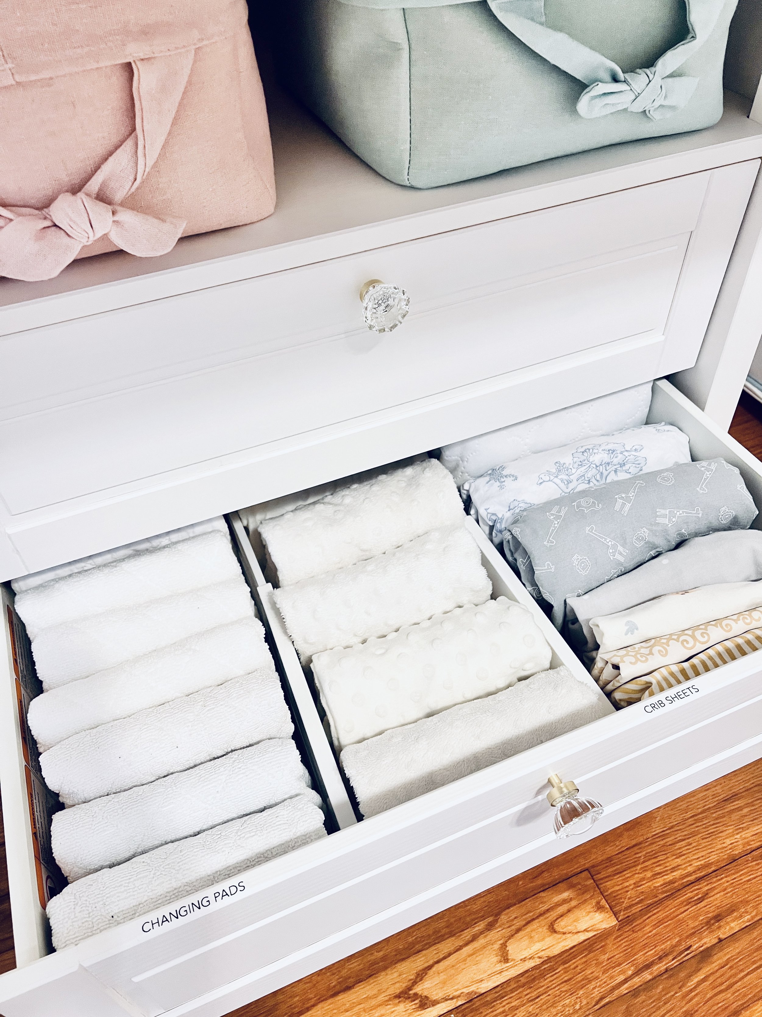 sorted-professional-organizing-new-orleans-nursery-dresser-drawer-changing-pads-and-crib-sheets.jpg