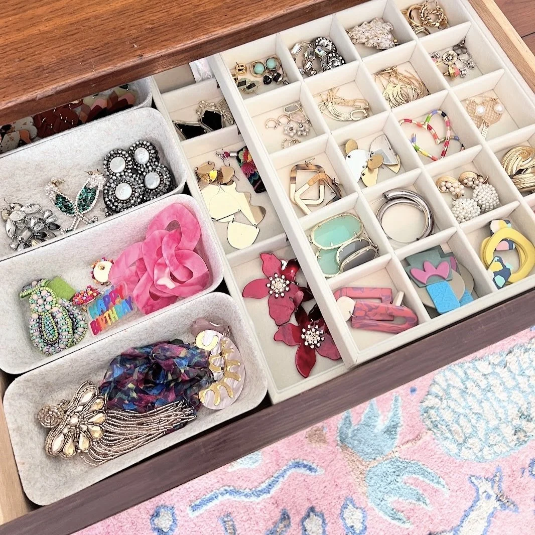 Drawer organized with felt bins and stackable jewelry organizers, decluttered by Sorted Professional Organizing in New Orleans.