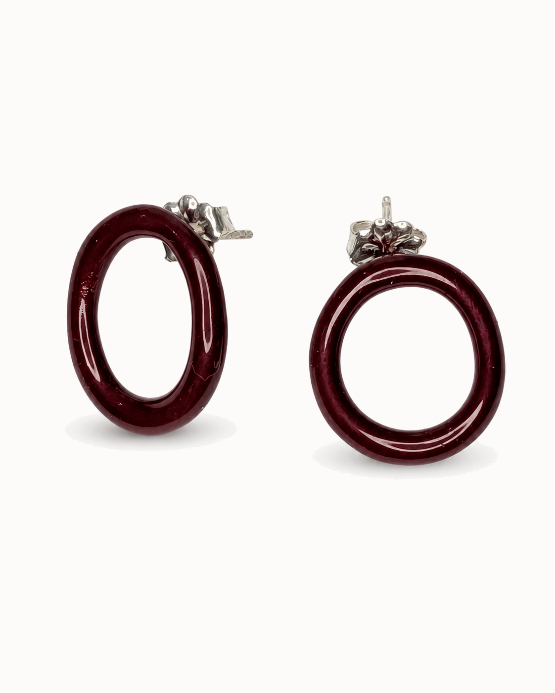 Deep berry red enamel studs.