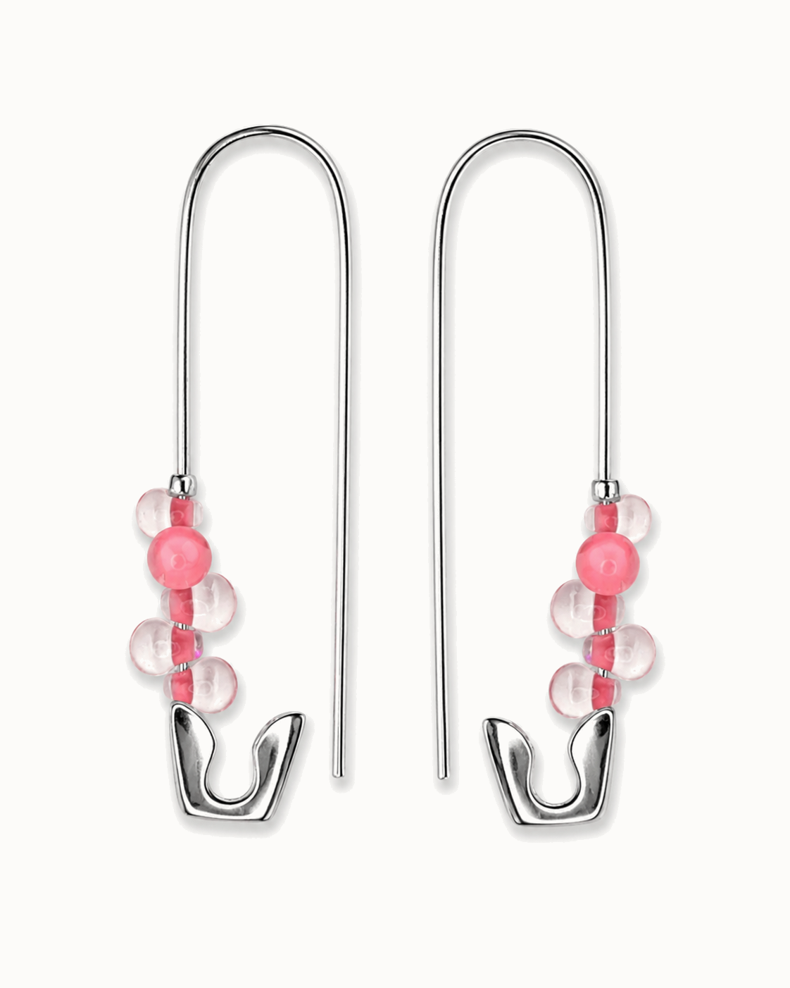 Playful sterling silver safety pin earrings finished with clusters of pink crystal beads.