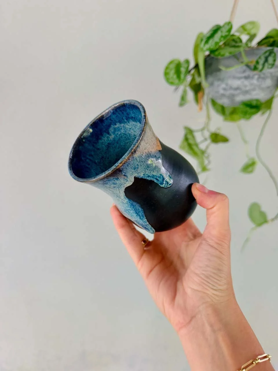 wheel-thrown-stoneware-mug-black-glaze-speckled-clay.jpg