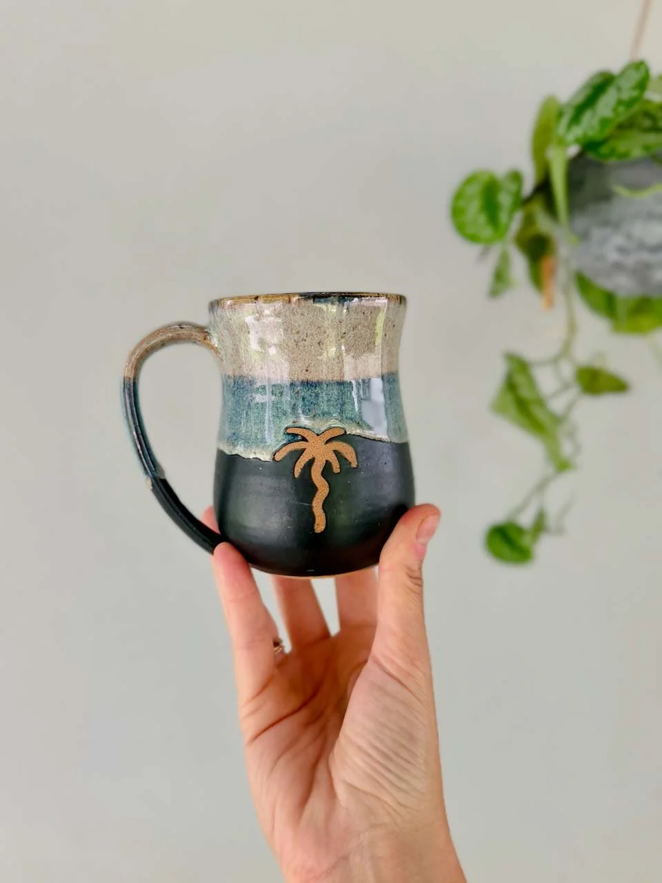 handmade-pottery-mug-matte-black-tropical-palm.jpg