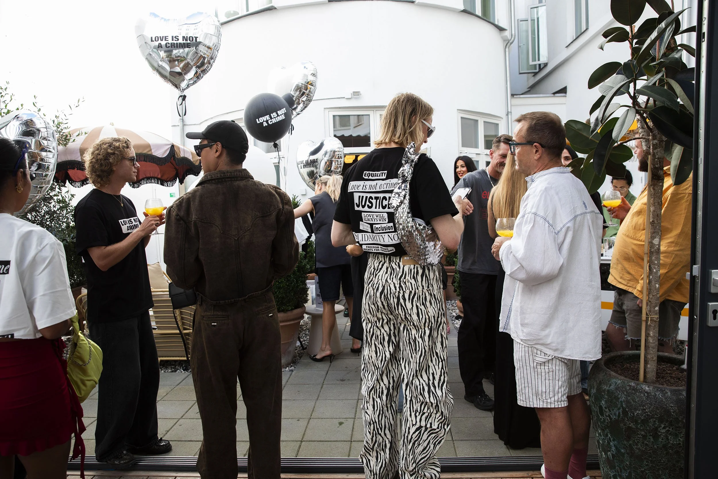75_LoveisnotacrimeXRotate_PrideParty_aug2025_Helenalundquist_616A5604.jpg