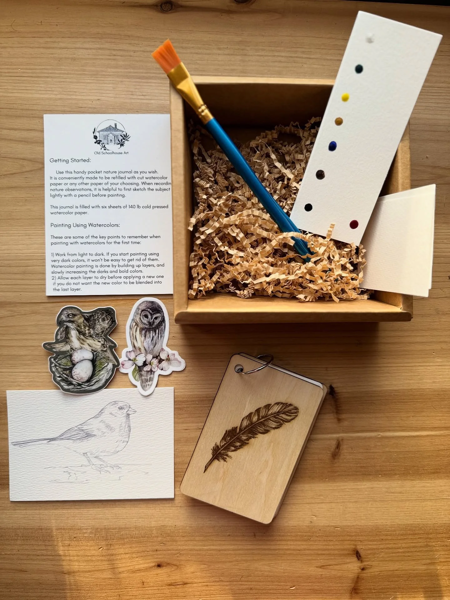 In the spring I over purchased some art supplies for teaching a watercolor class to kids. Oops. My twins have since been sneaking into the drawer of materials. Even during assembly, one 3 yr old snatched some paints, watercolor paper, and one of the 