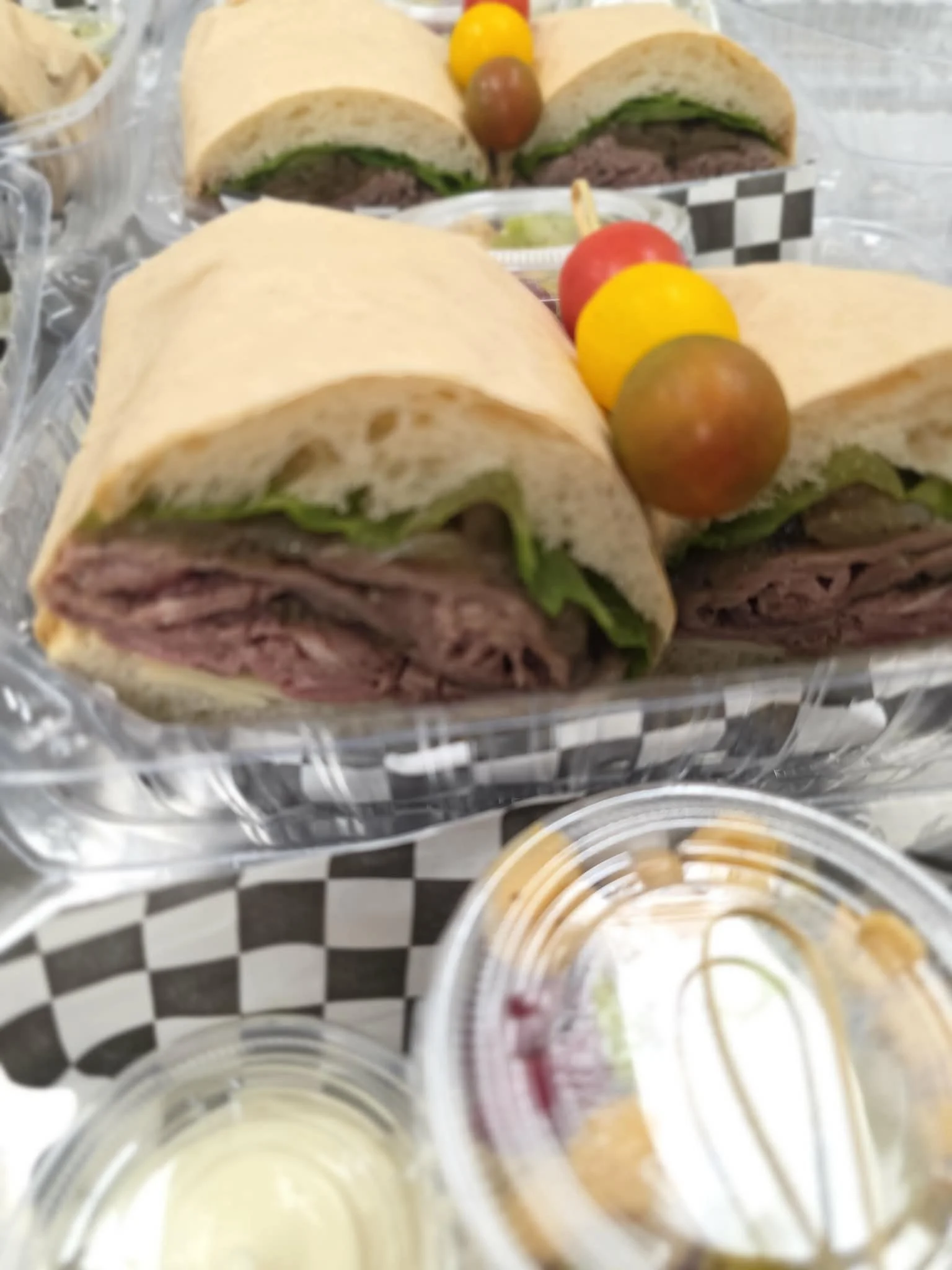 Tri-tip sandwich with caramelized onions, garlic aioli, gouda, chimichurri and fresh tomatoes. Part of Grab'n'Go by Mama D's, our wholesale food line.