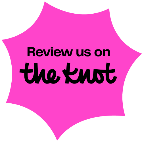 Pink starburst with black text that says, "Review us on the knot."