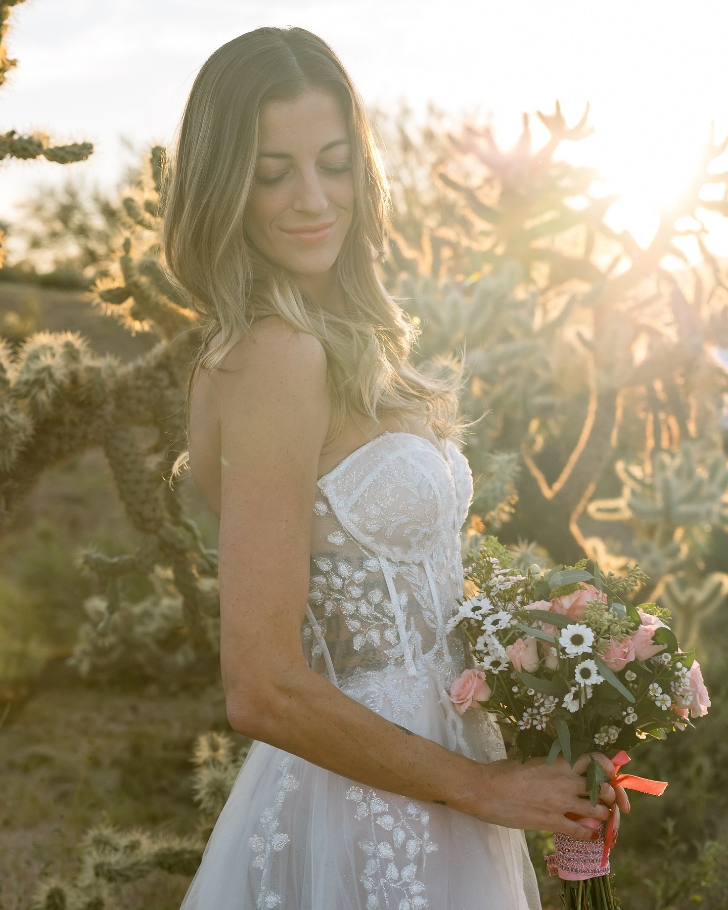she&rsquo;s a glowing wife ✨ I love the contrast of soft lace and tule of her dress with the sharp cacti in this shot of @xoxobrimet 

📍: somewhere near Lost Dutchman state park

#azwedding #azbride #ido #married #weddingphotography #weddingphotos #