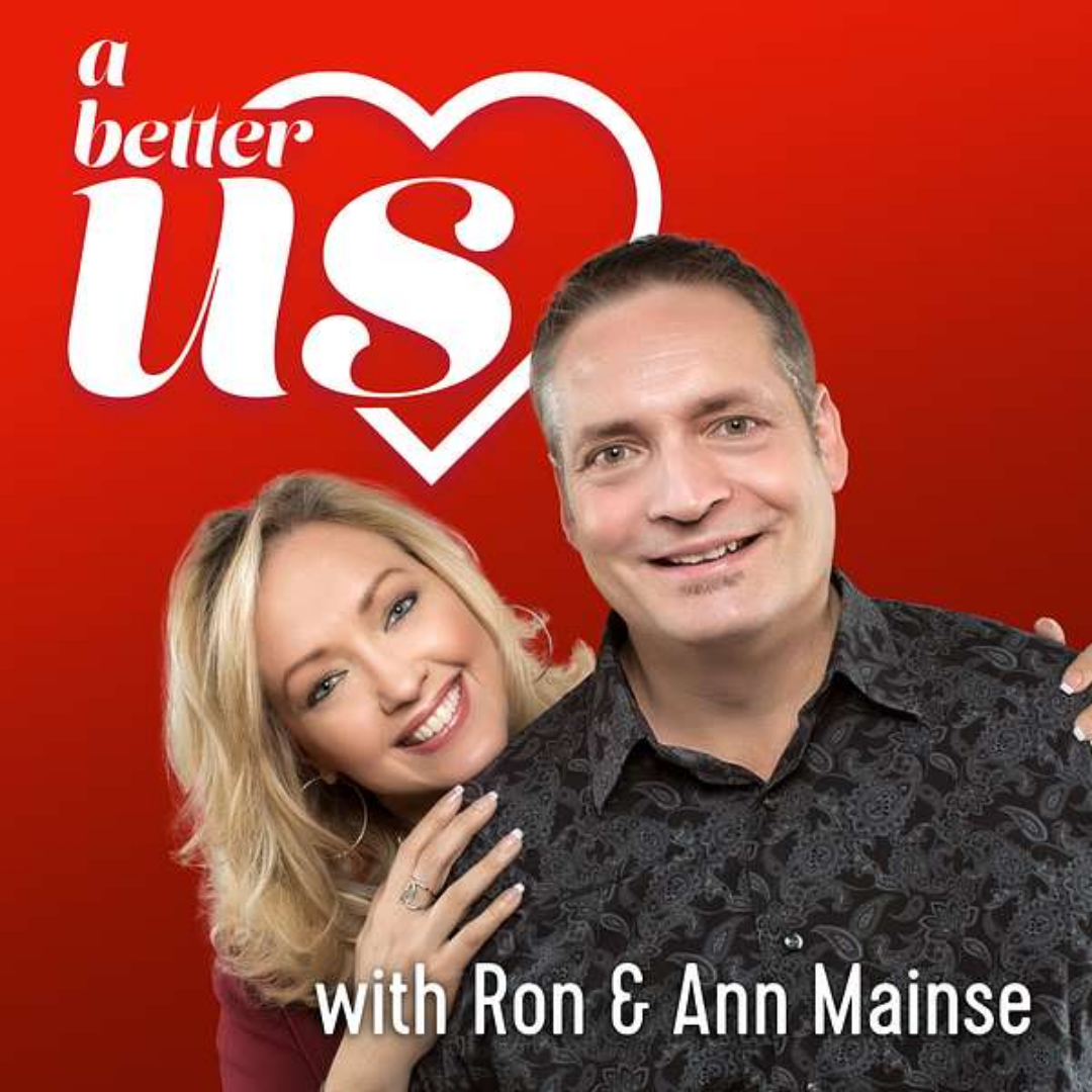 Cover photo for a show or podcast featuring Ron and Ann Mainse. The background is red with white text that reads "a better us" within a heart outline. Ron and Ann Mainse are smiling, with Ron wearing a patterned black shirt and Ann resting her hand on his shoulder.
