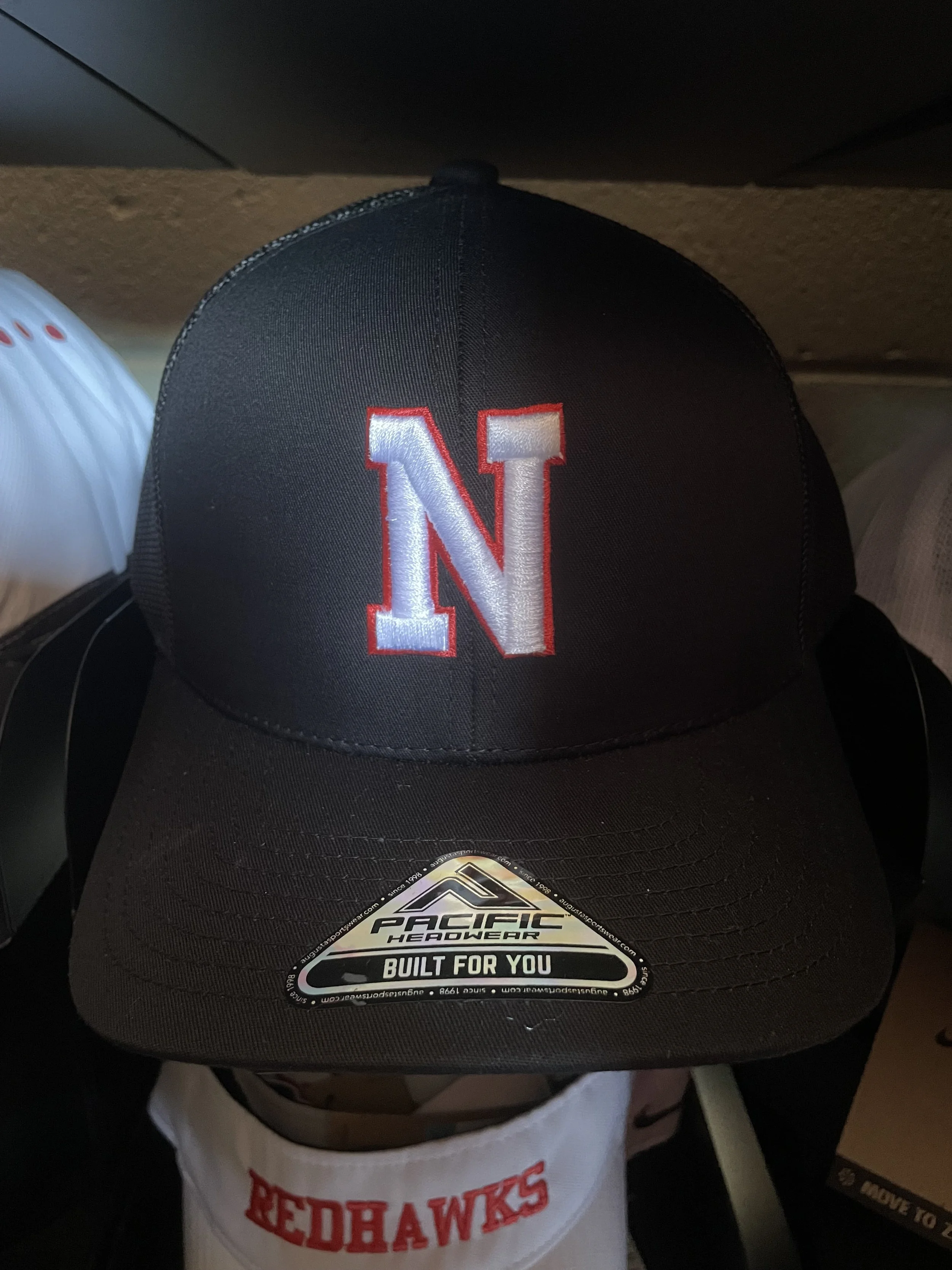 Black Trucker Hat w/ Red Shadow "N" in white