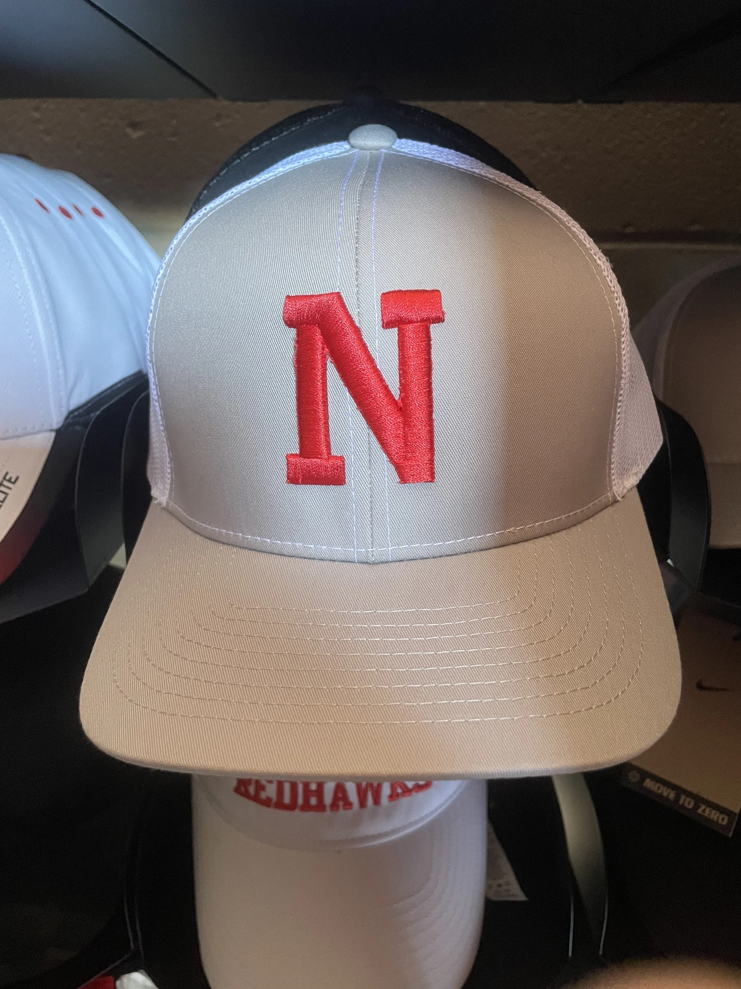 Grey and White Trucker Hat w/ "N" in Red