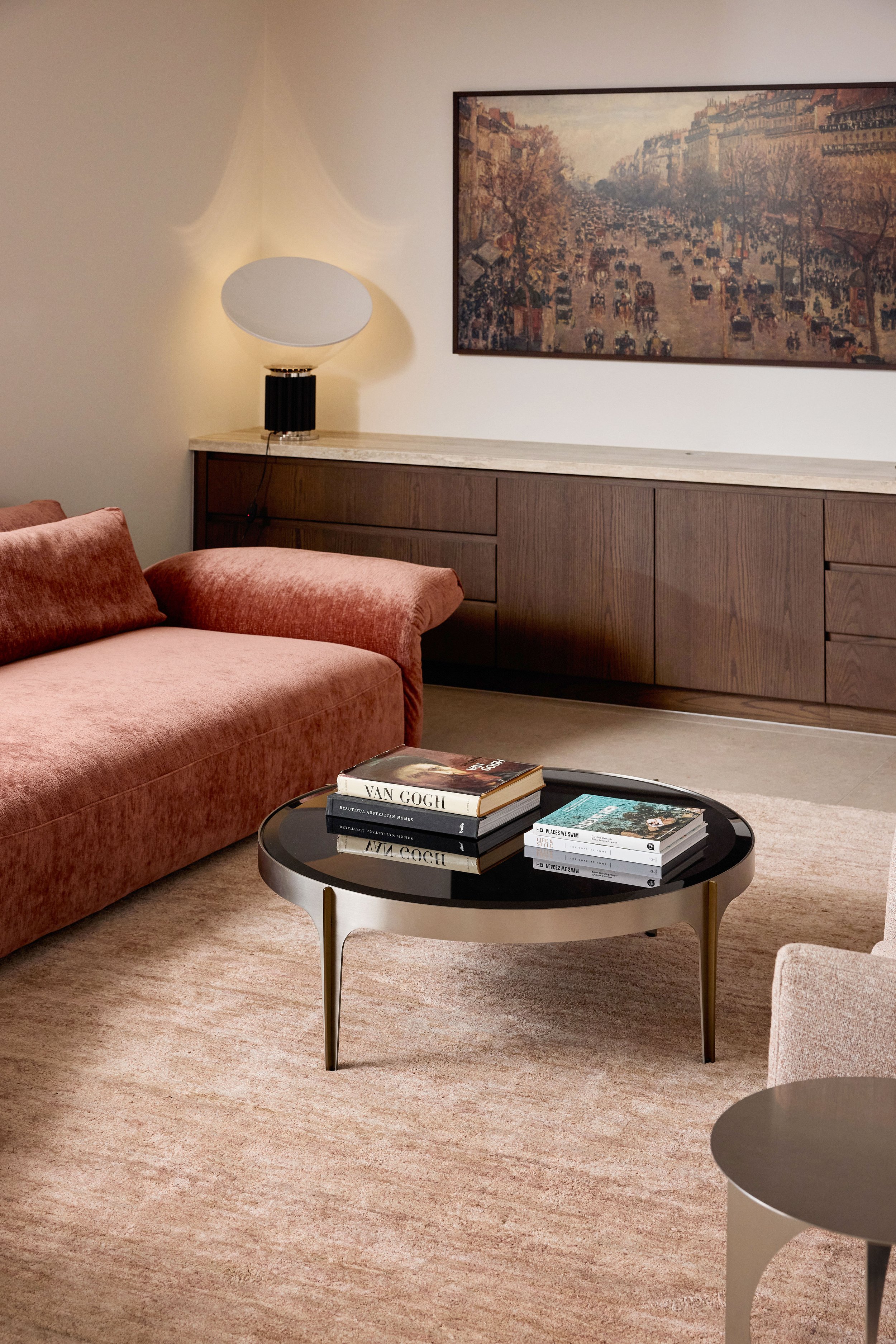 sofa with rug, coffee table and feature table lamp