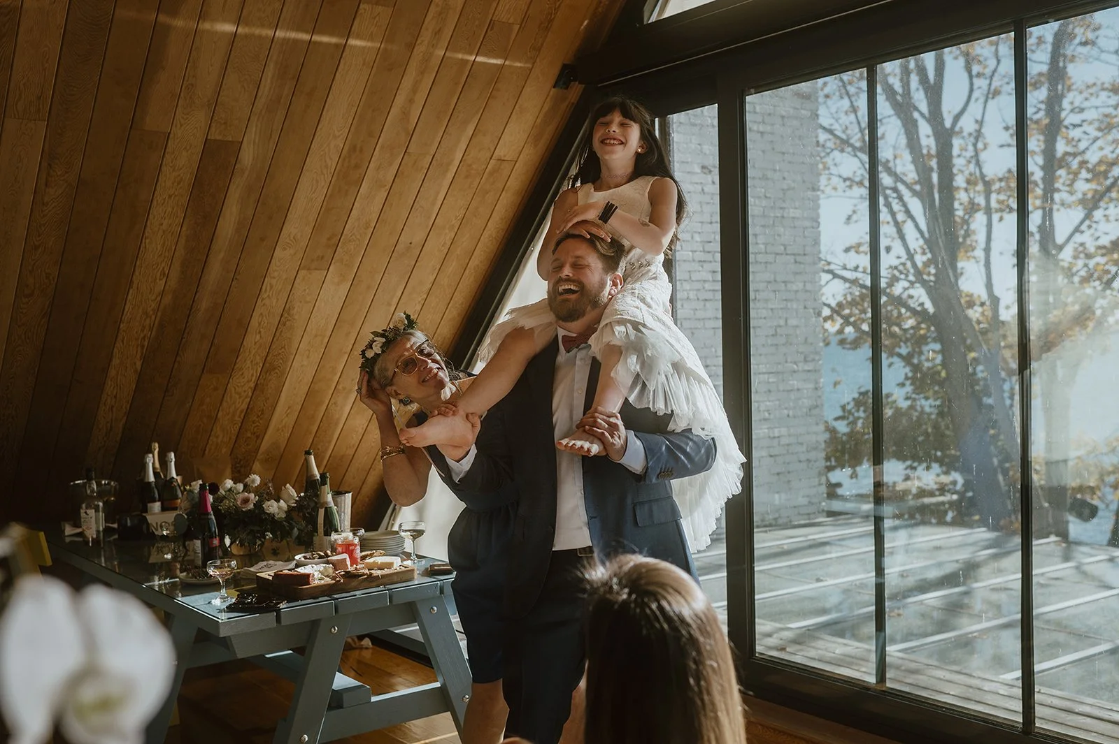 Candid photography of guests at an elopement ceremony at the Drake Hotel in Prince Edward County