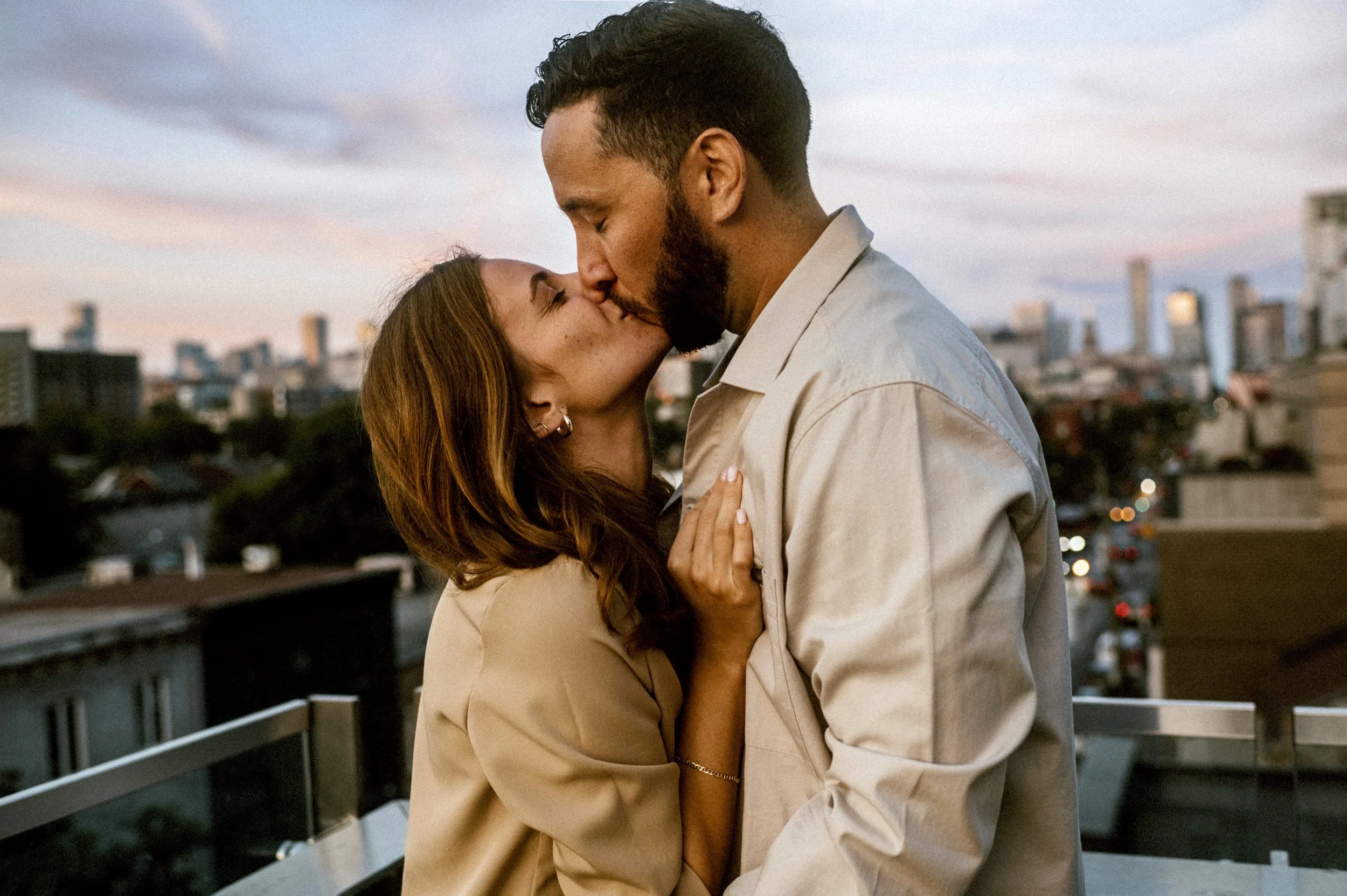 Surprise proposal on toronto rooftop candid photography