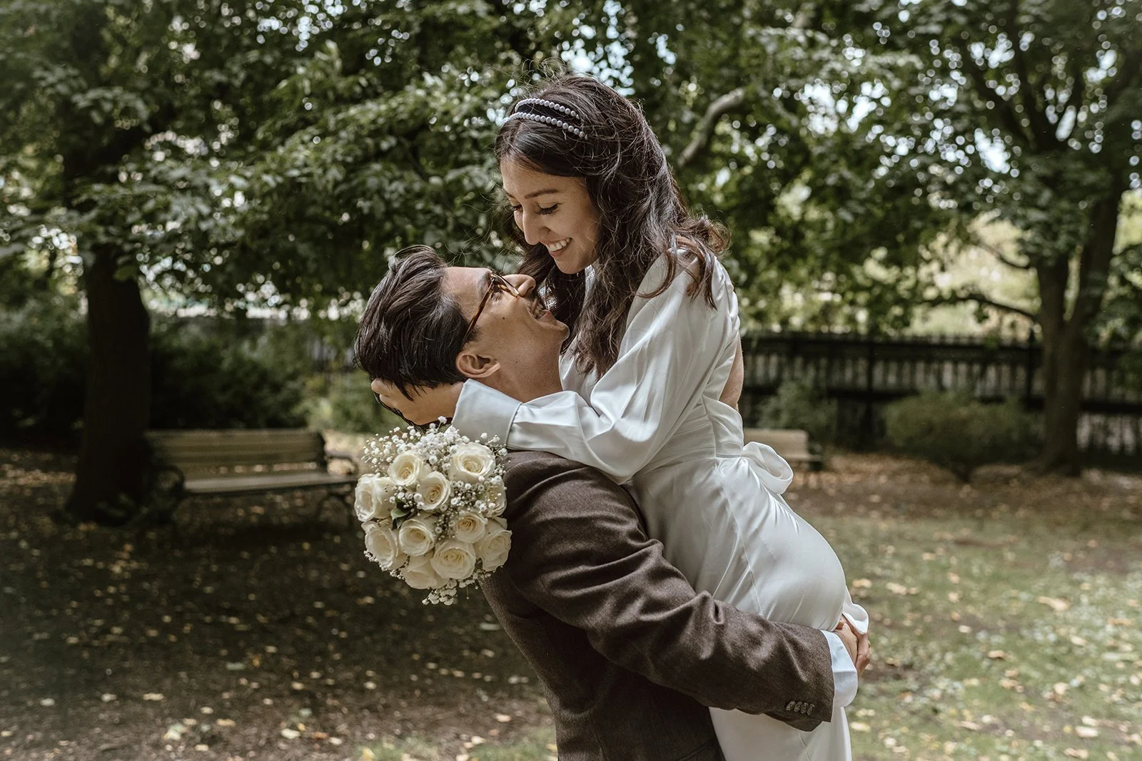 bride and groom after small wedding ceremony in toronto city hall celebrating