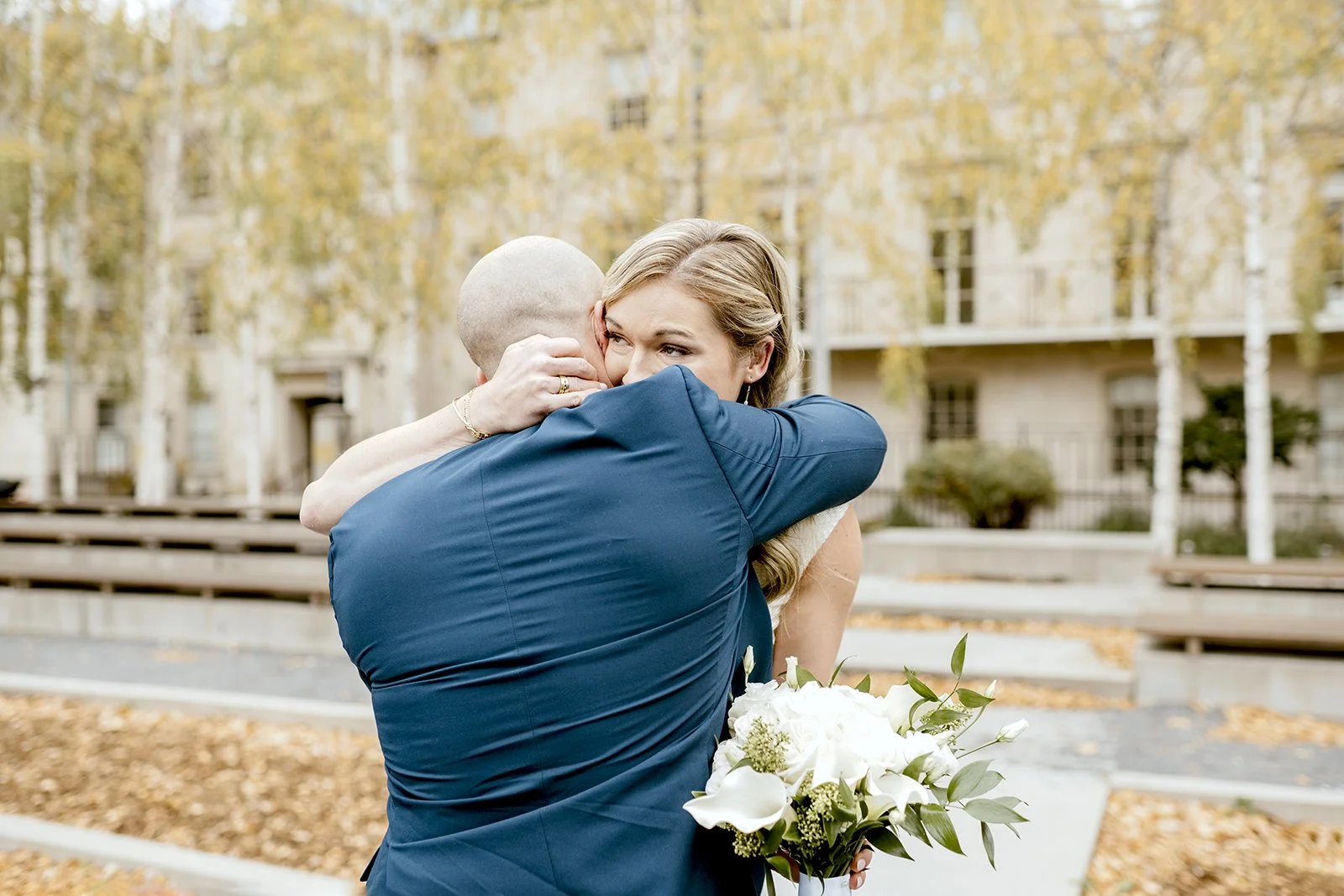 Bride and groom's first look photo before wedding ceremony at Toronto City Hall