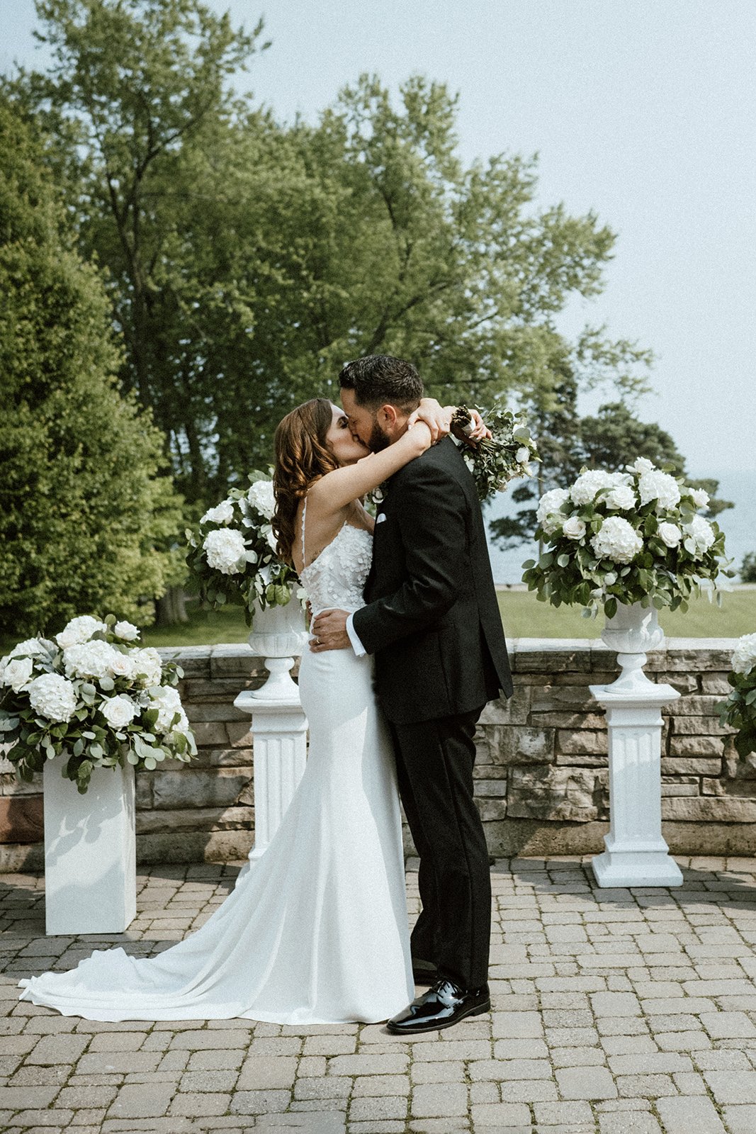 Couple kissing during their small wedding ceremony in toronto