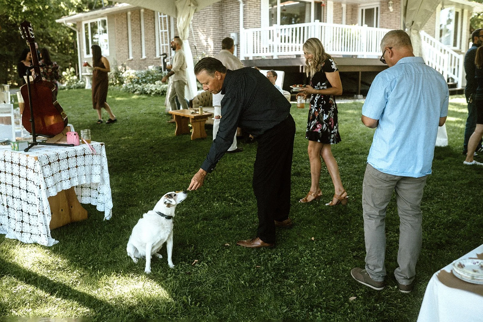 Small backyard wedding in toronto that features the bride's dog