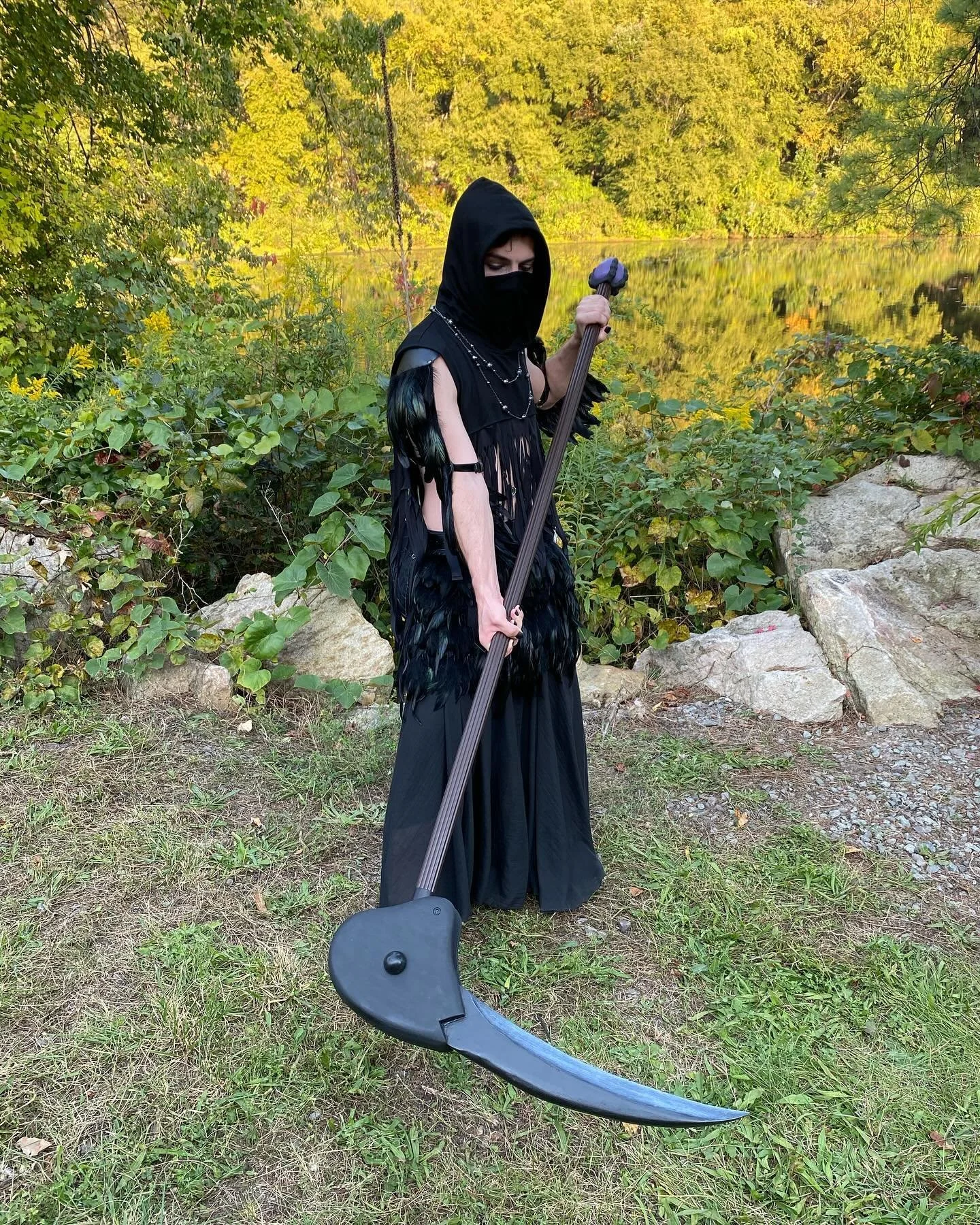 Get scythed! This custom build was created for a customer&rsquo;s original costume at the Renaissance Faire! It is hinged to fold the head and has a hand carved ball and claw foot. Interested in bringing props, accessories, or ideas to life? Reach ou