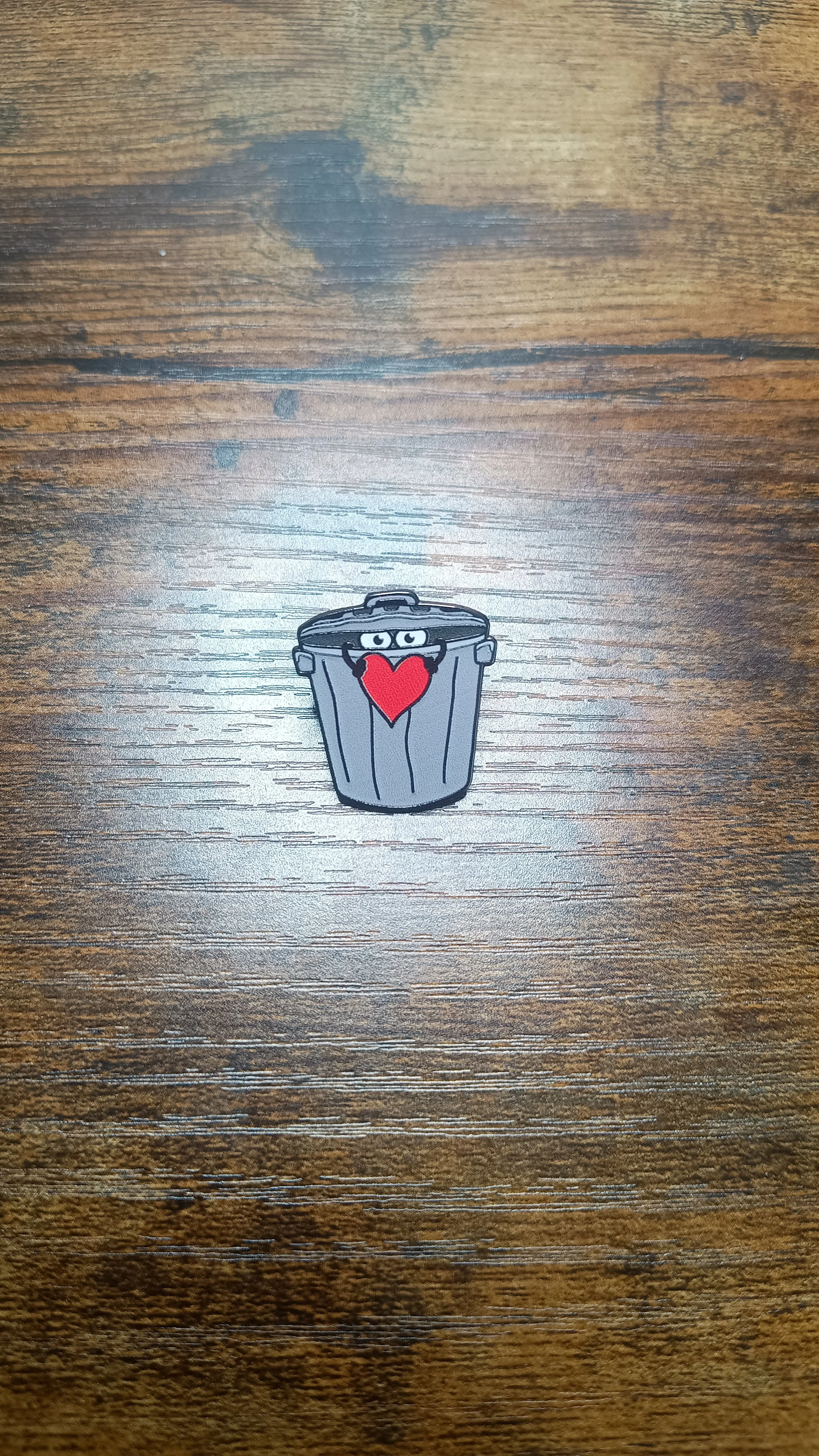 Trever the trash can (Love heart) 1 inch hard enamel pin with a safety clutch.