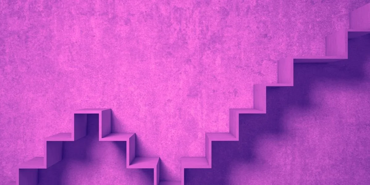 Pink staircase stepping up and down against a textured wall, representing non-linear insomnia recovery progress.