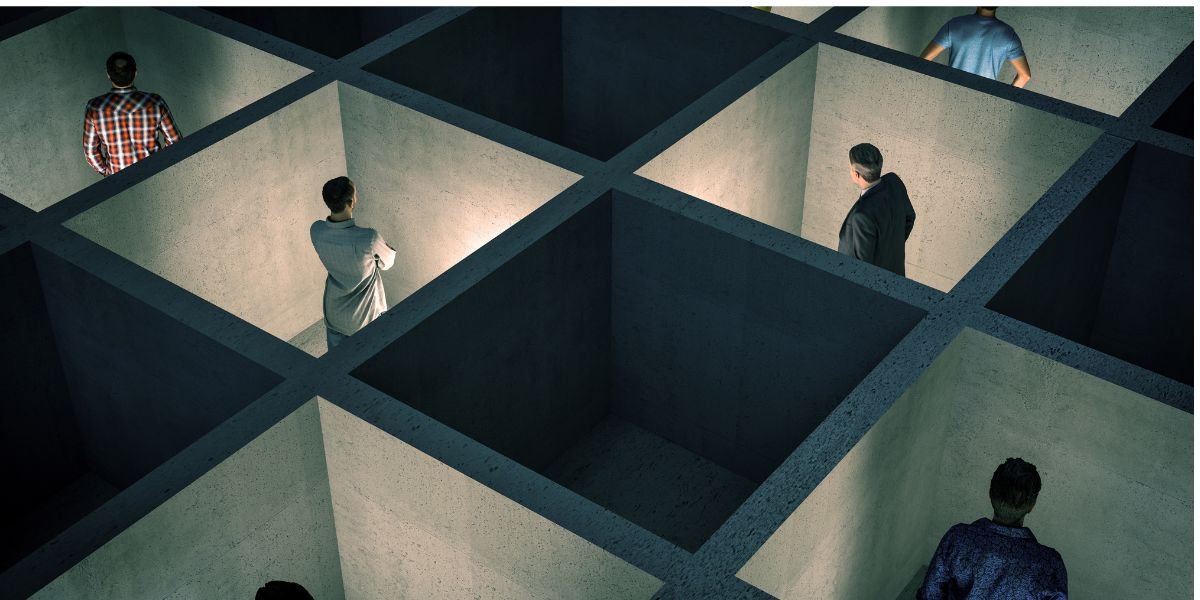 Abstract aerial view of people isolated inside a grid of concrete boxes, symbolizing the rigid trap of sleep restriction therapy.