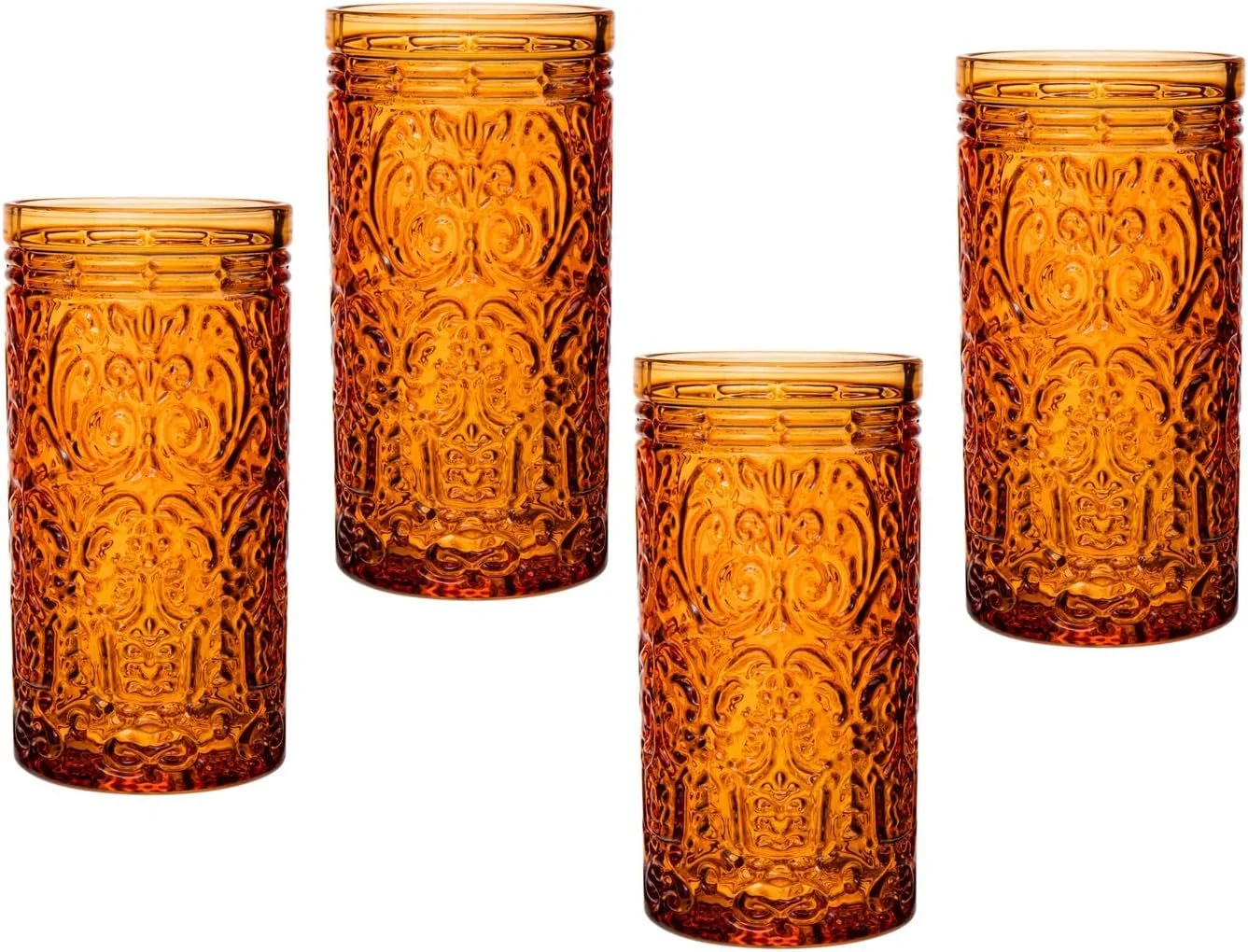 Four amber-colored glass tumblers with intricate embossed patterns, arranged in a staggered formation on a white background.