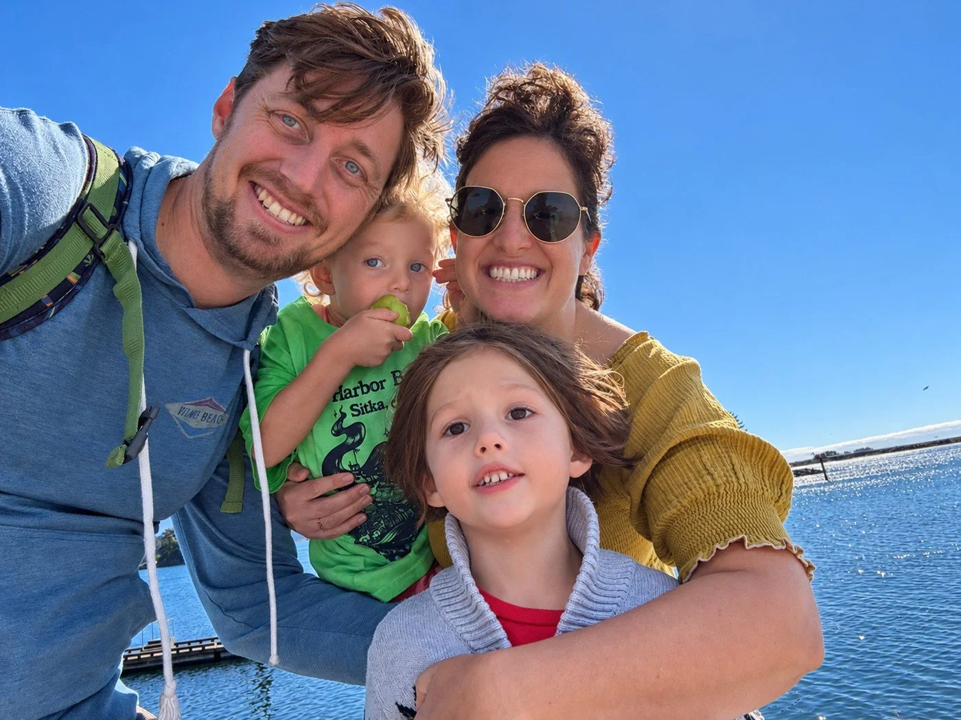 Dr. Clay Celander with his family by the waterfront
