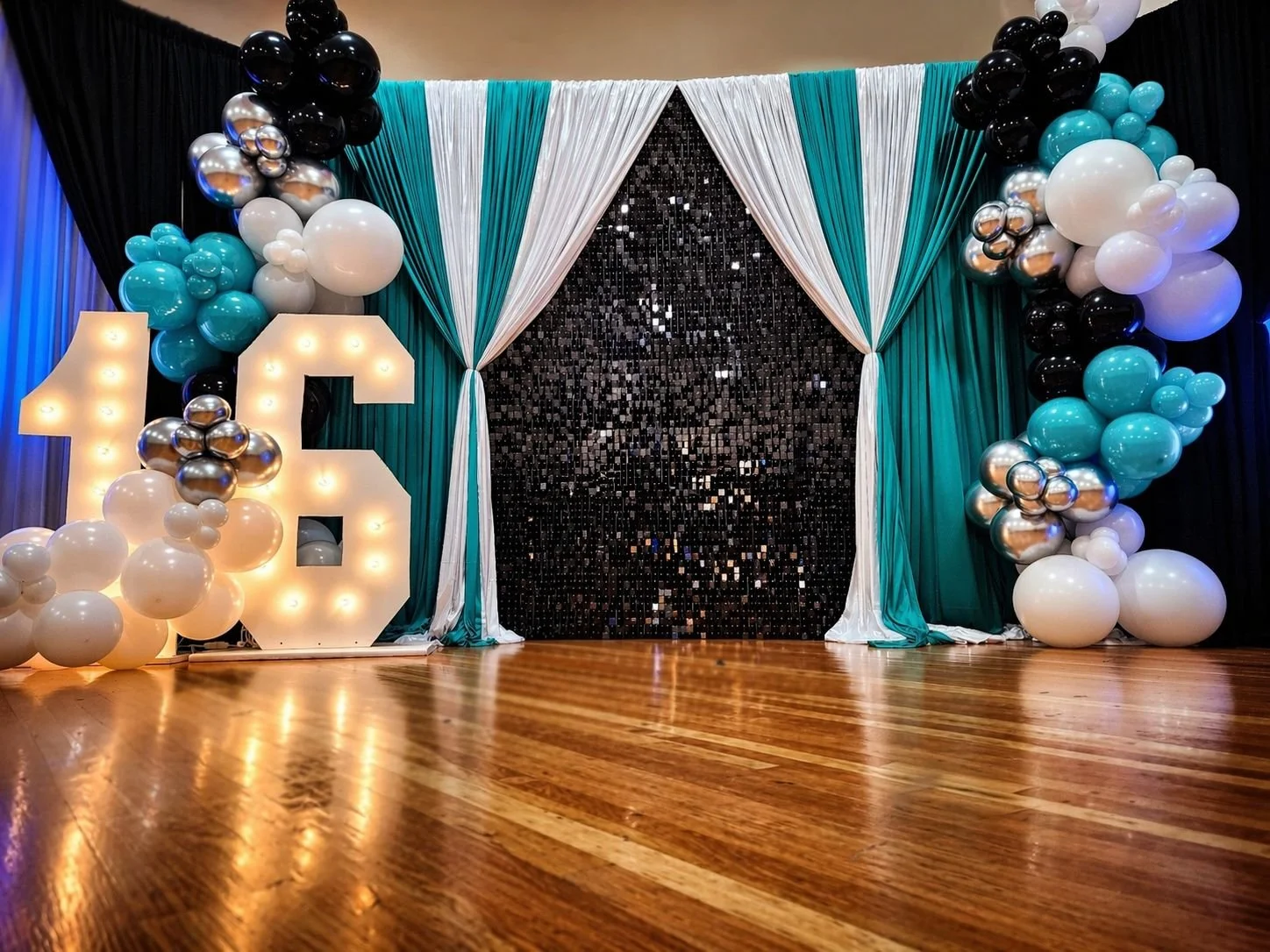 Black shimmer wall with pipe & drape