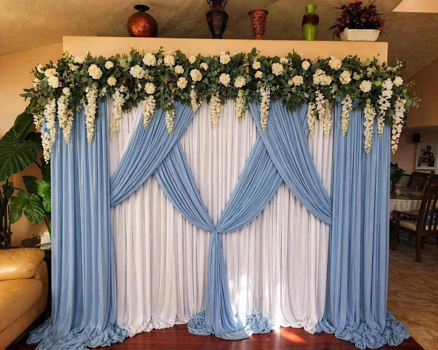 White pipe & drape backdrop swagged with florals.jpg