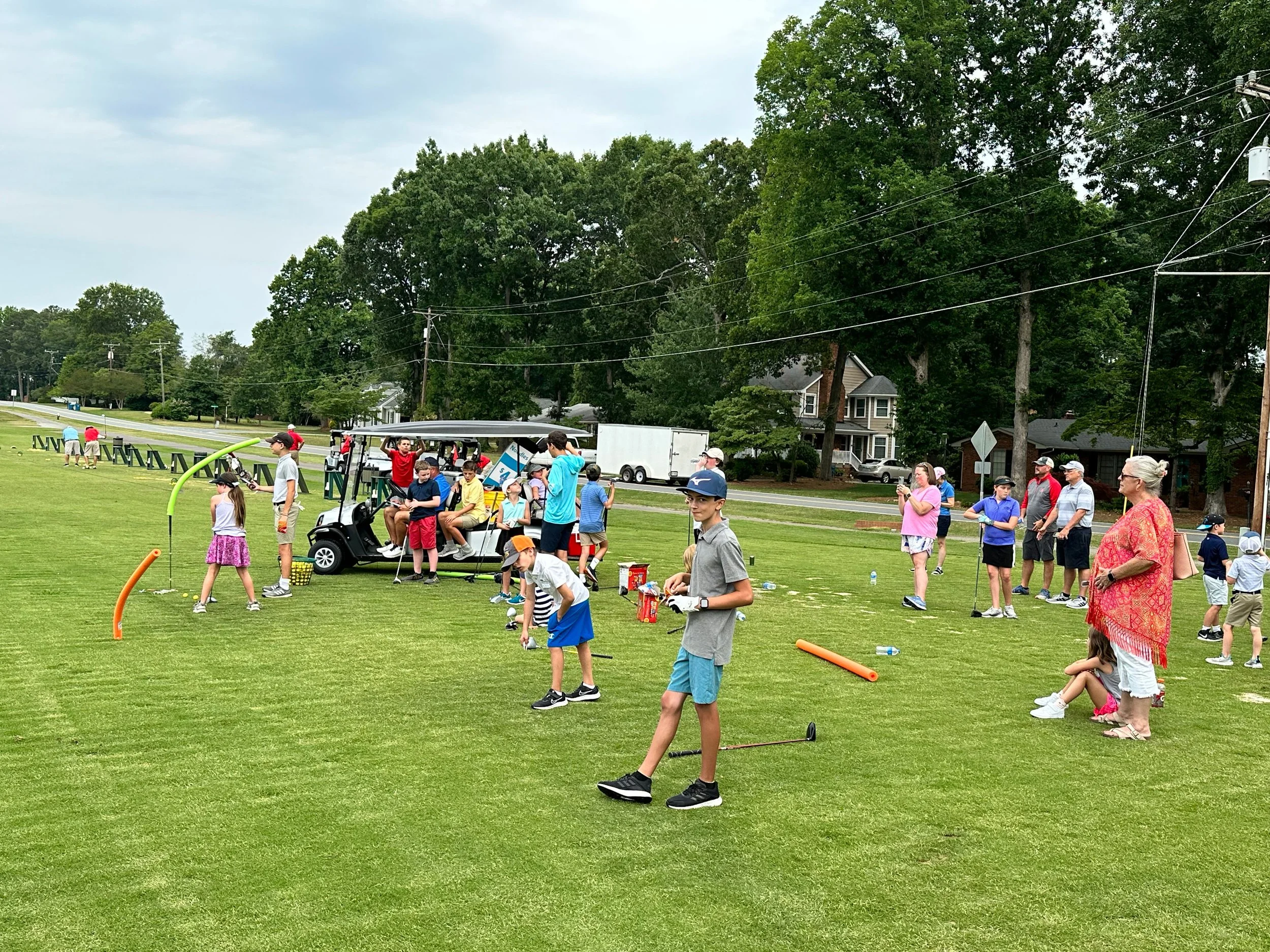 Young golfers participating in a Golf Gem junior camp