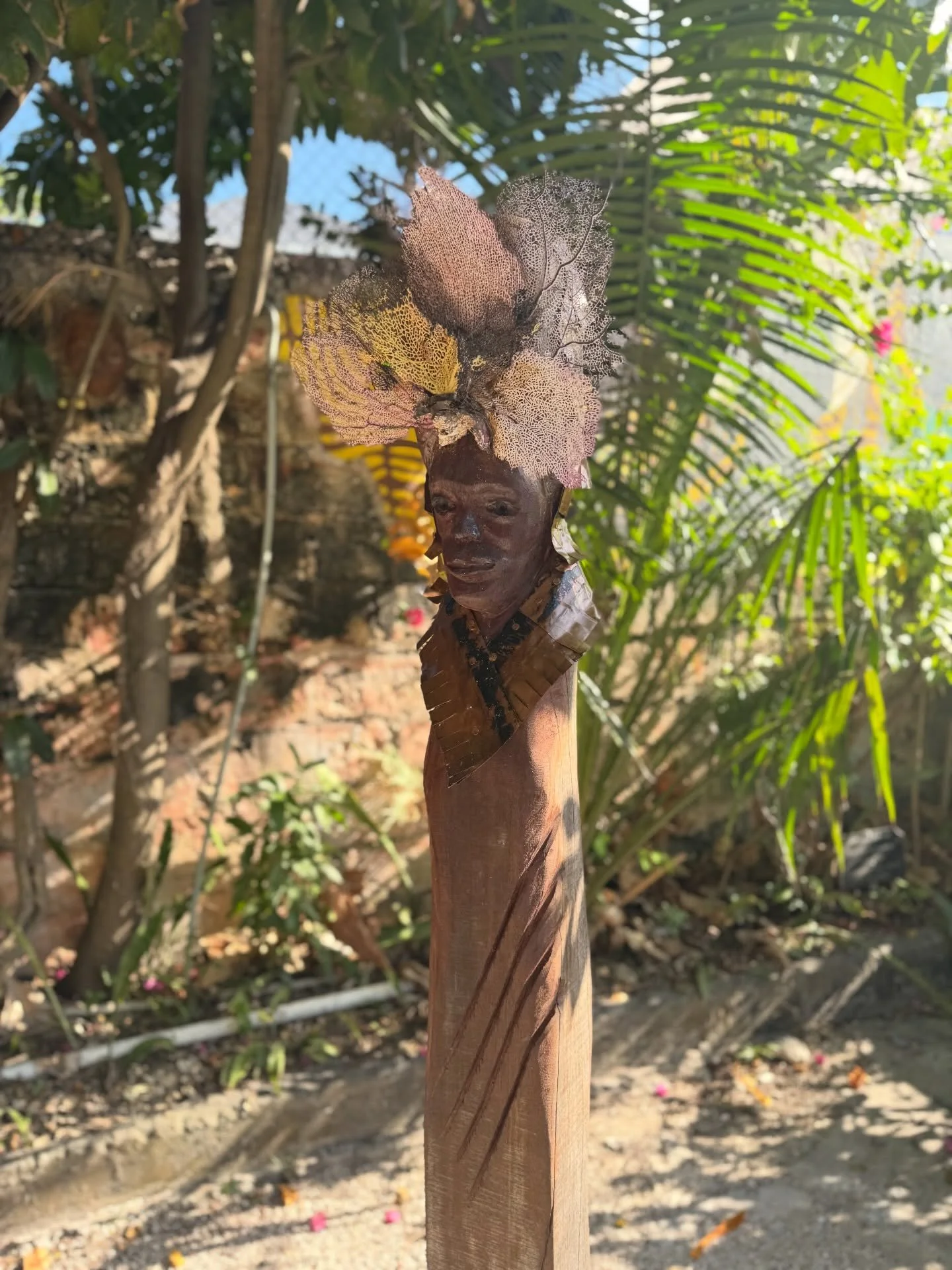 Celebrating Women&rsquo;s History Month

&ldquo;The Gatekeeper&rdquo; by Antonius Roberts, OBE honours women&rsquo;s contributions to history, culture, and society.

Nestled beneath the breadfruit tree in our courtyard, she stands as a witness&mdash;