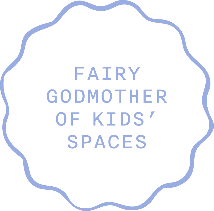 A black circular badge with a wavy light purple outline, containing text that reads 'Fairy Godmother of Kids' Spaces' in purple.
