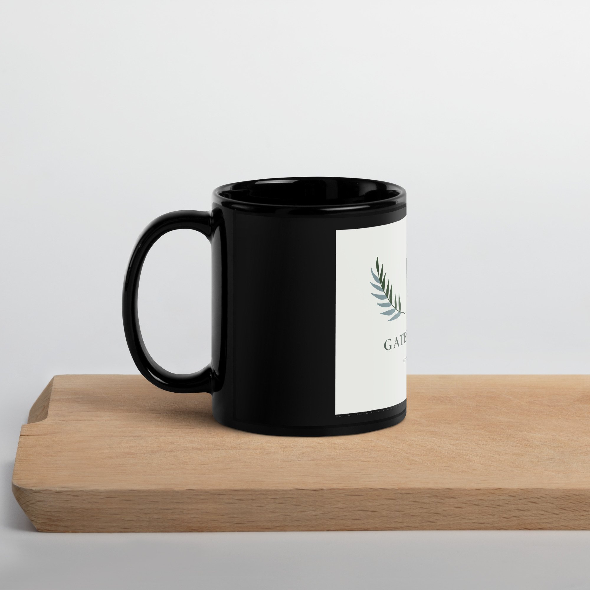 black-glossy-mug-black-11oz-handle-on-left-6460377e6e973.jpg