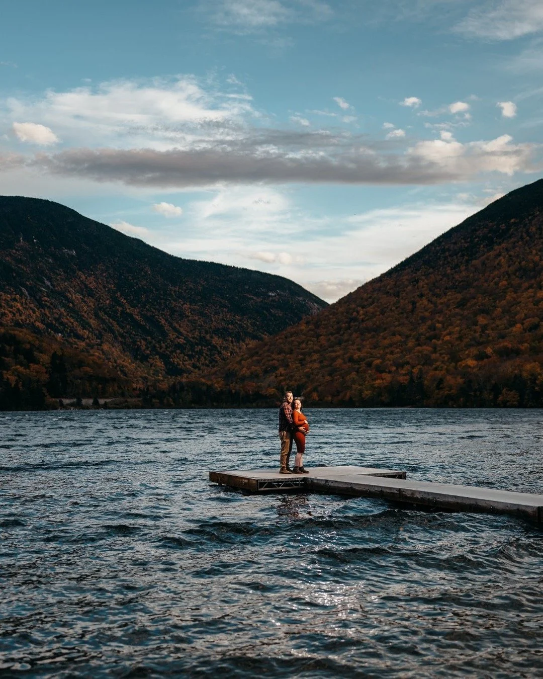 Zack and Holly embraced a windy day in the White Mountains for their maternity session, and the wind gave us some of my favorite frames of the day. Fall color, a rippling lake, and a whole lot of joy ahead of welcoming their little one.

#nhmaternity