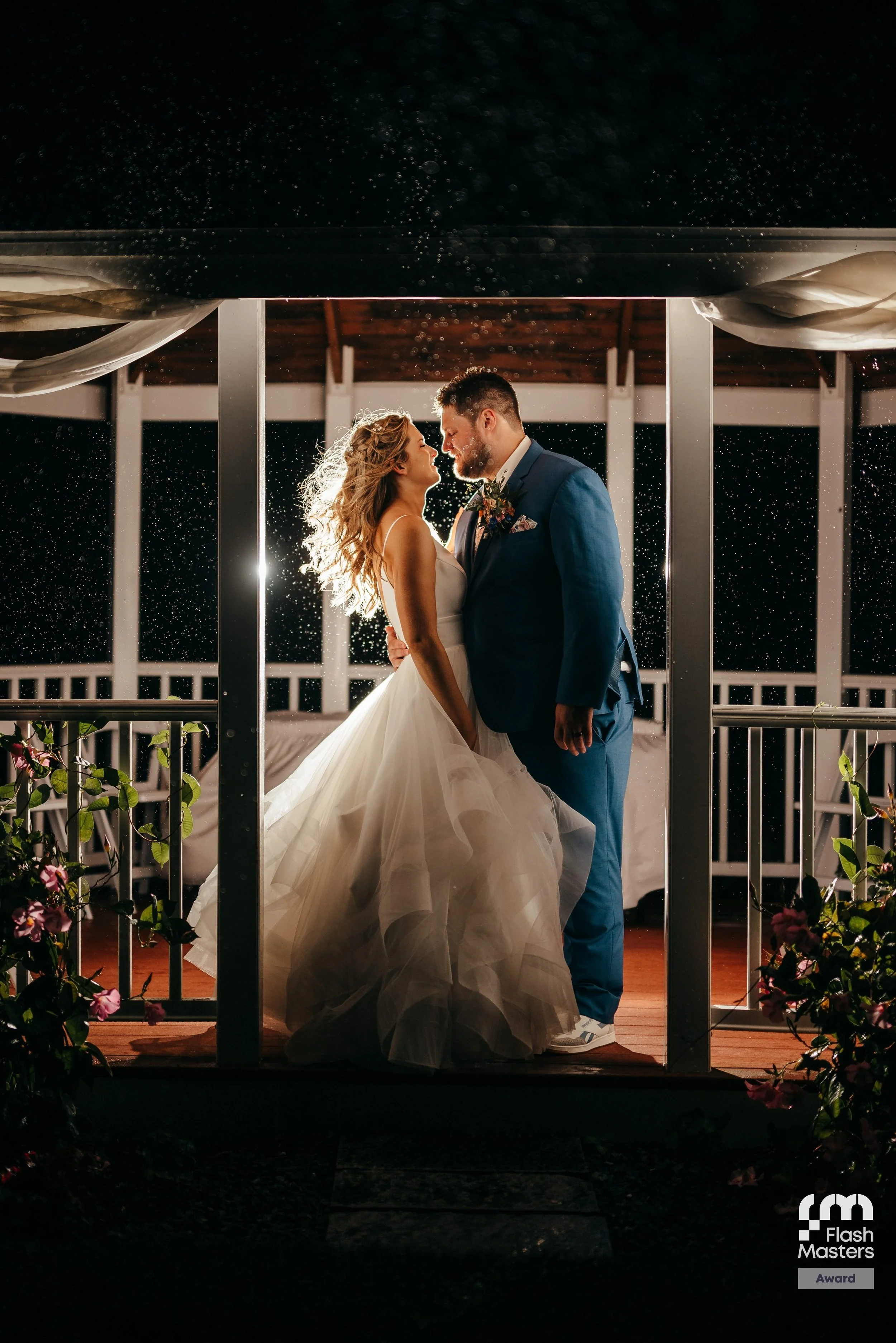 A kiss outside a Vermont barn