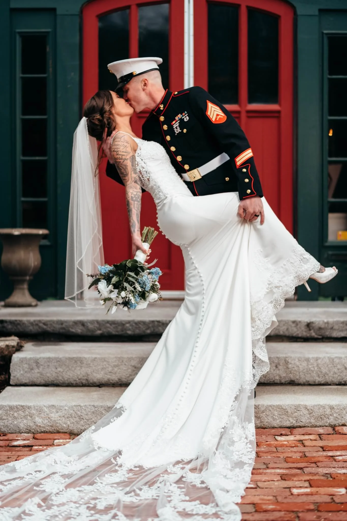 Military groom dip kiss