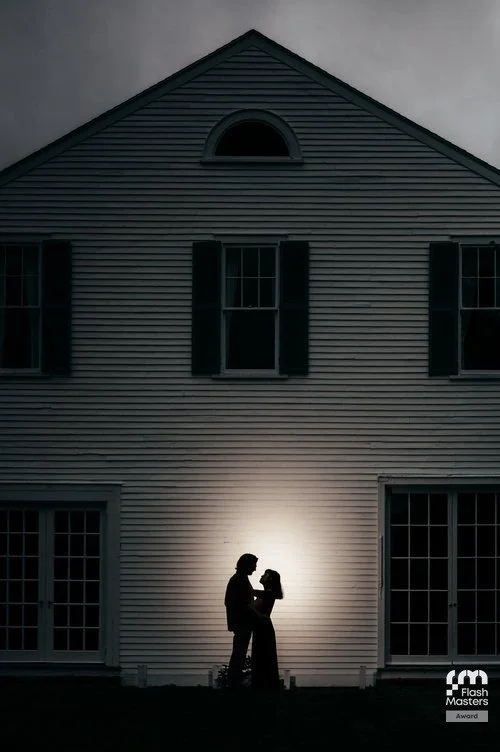 A pick up and kiss moment outdoors