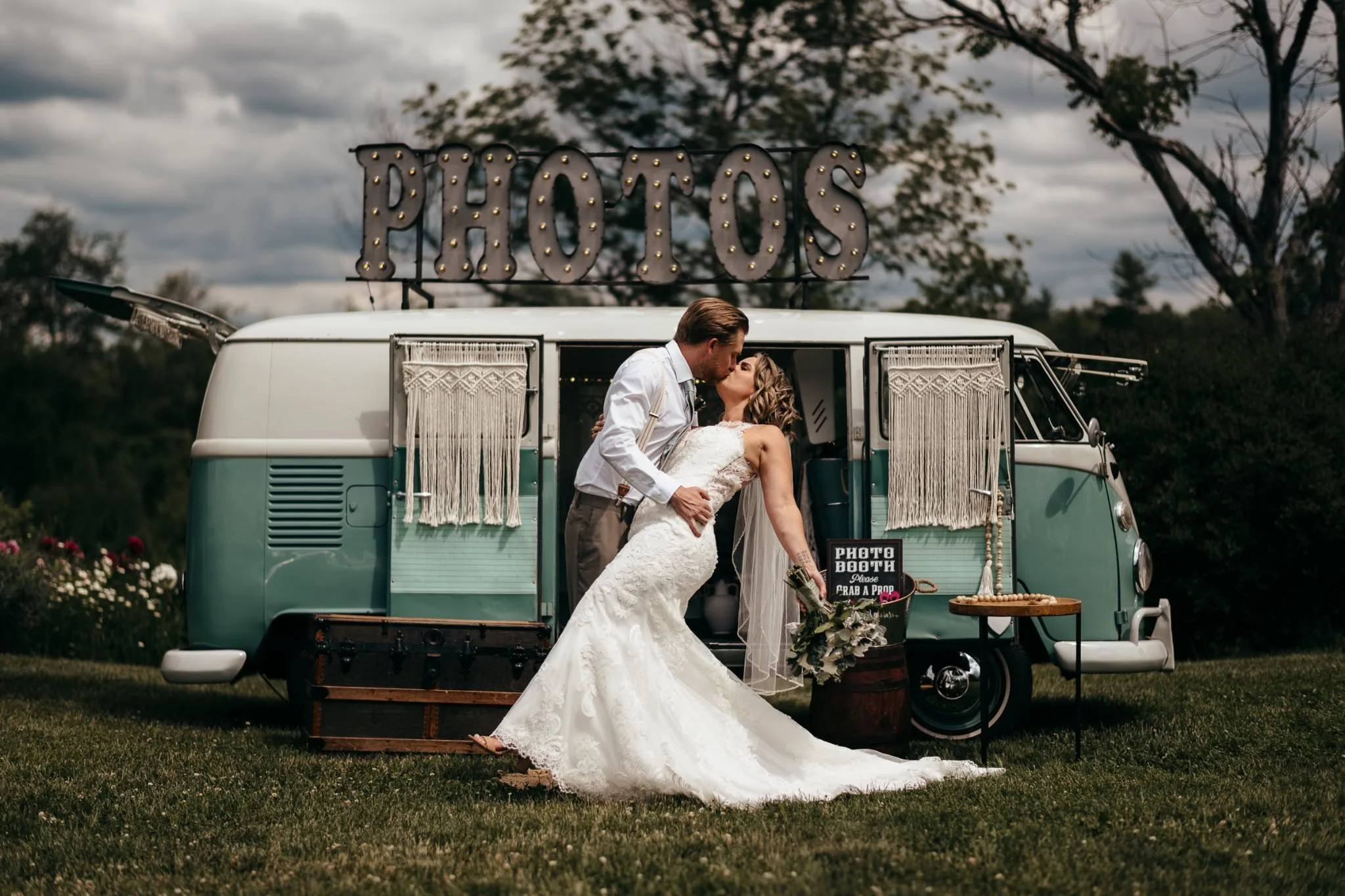 Kiss outside photo booth van